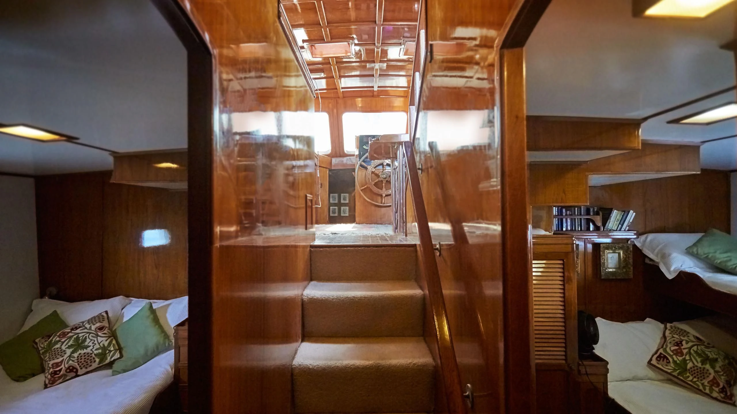 a room with a bed and a window aboard SLOW DANCE Yacht for Sale
