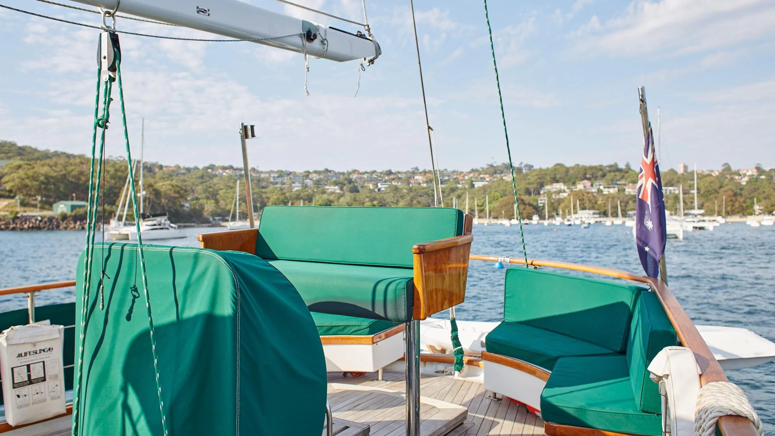 a boat with flags on it aboard SLOW DANCE Yacht for Sale