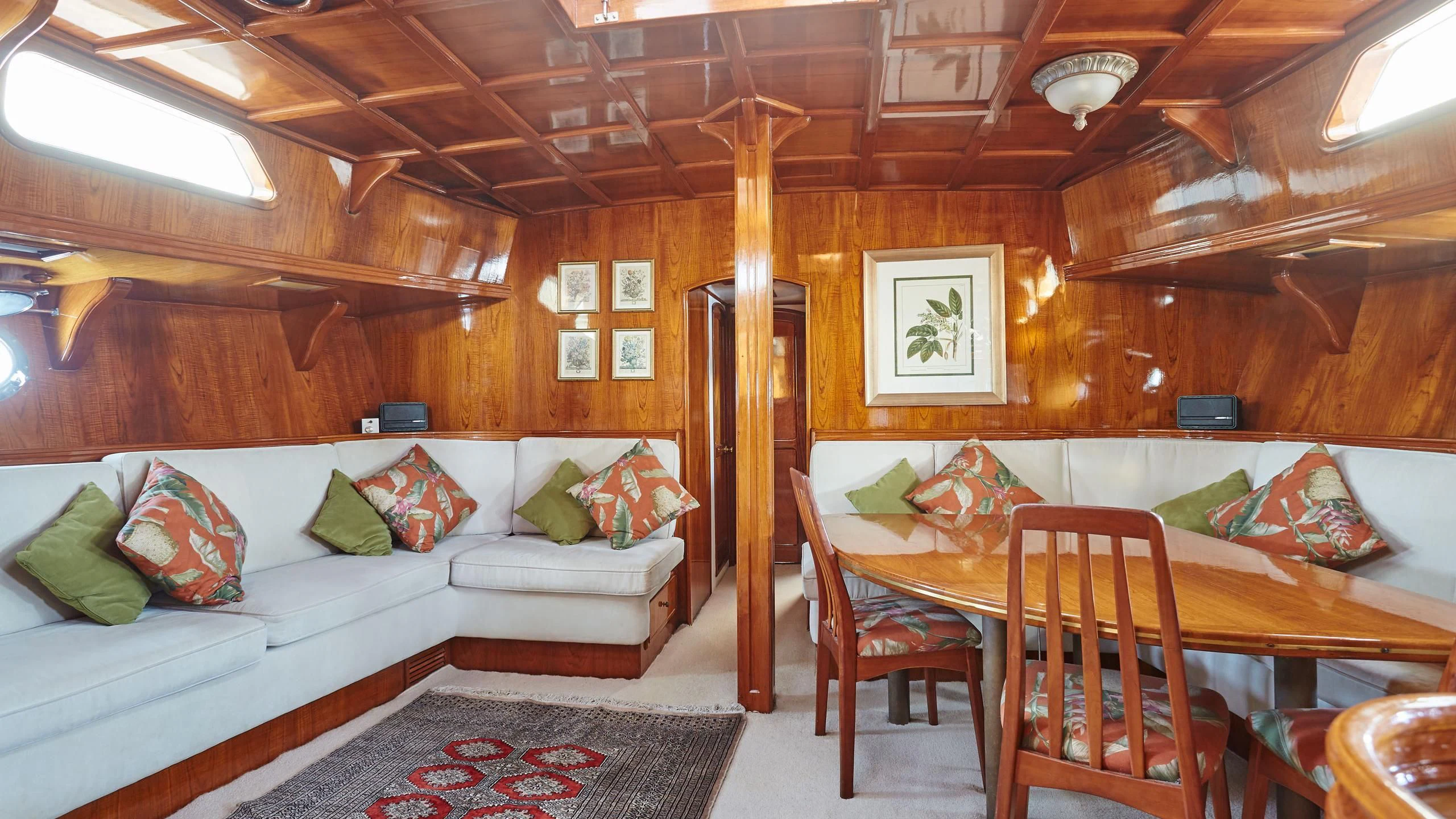 a room with a couch and a table aboard SLOW DANCE Yacht for Sale
