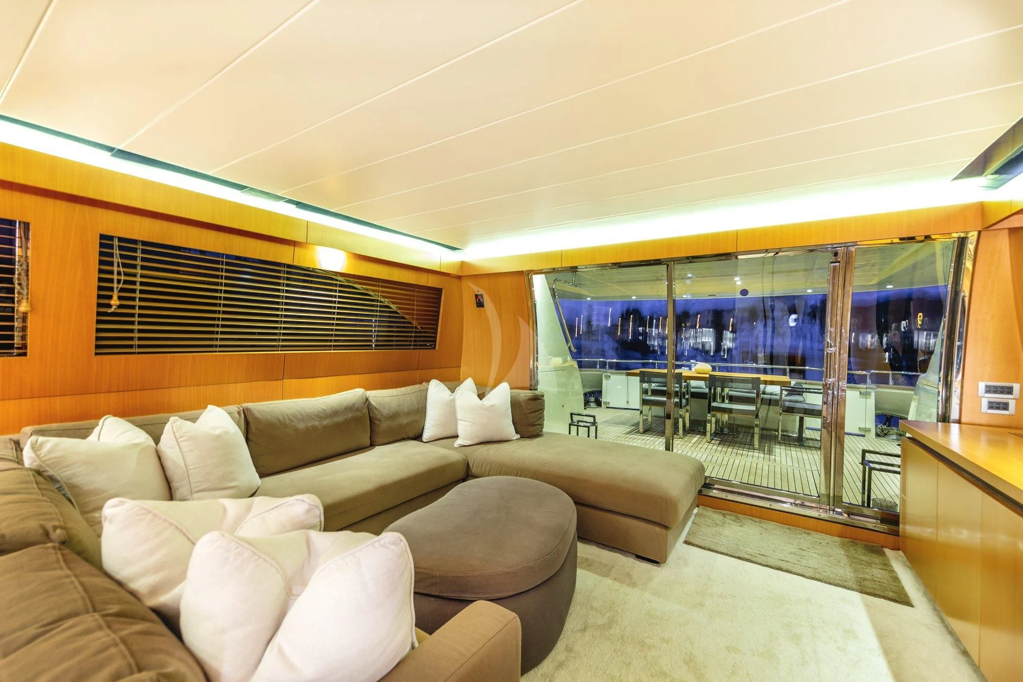 a living room with a large window aboard MINOU Yacht for Sale