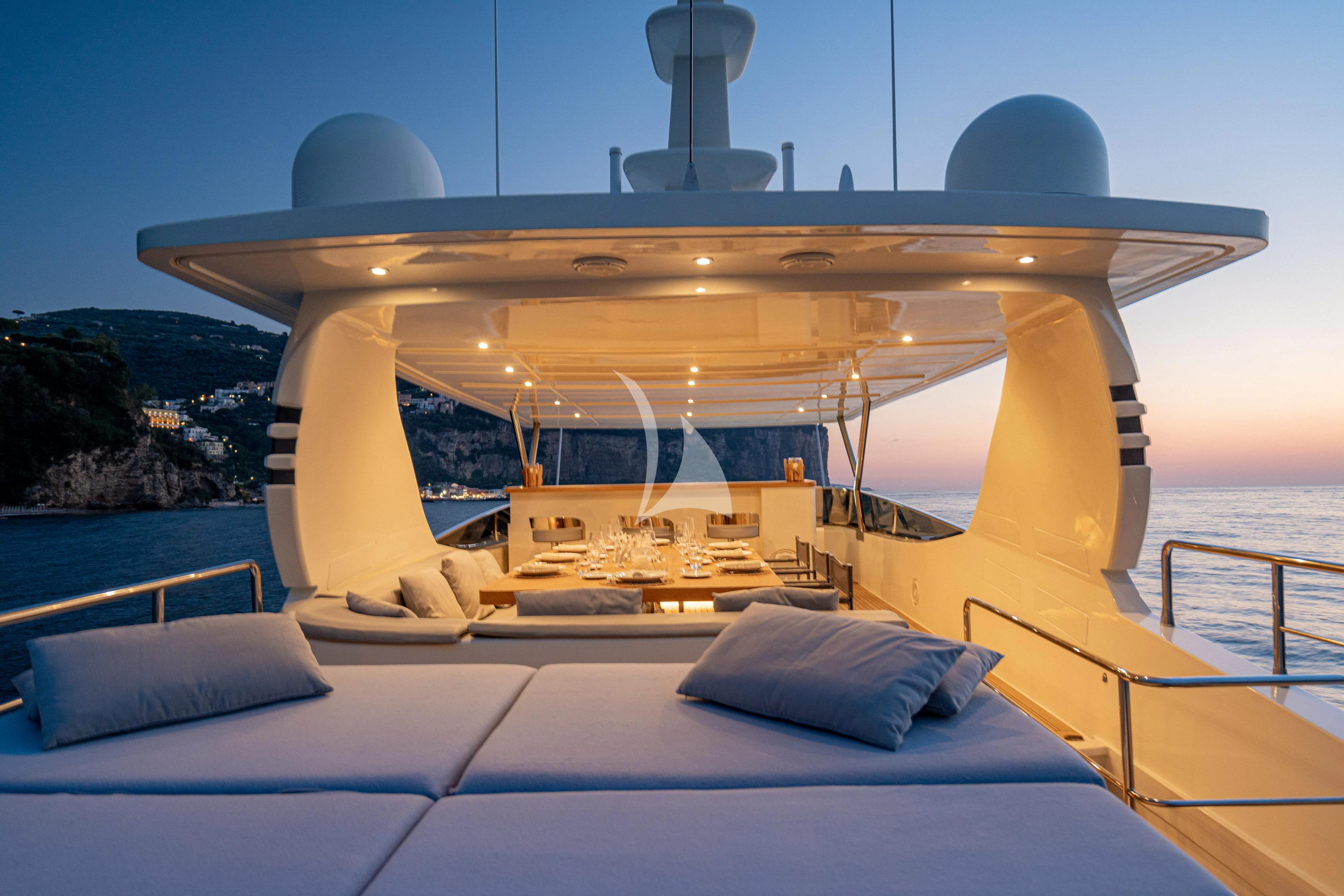 a large white boat on a body of water aboard MINOU Yacht for Sale