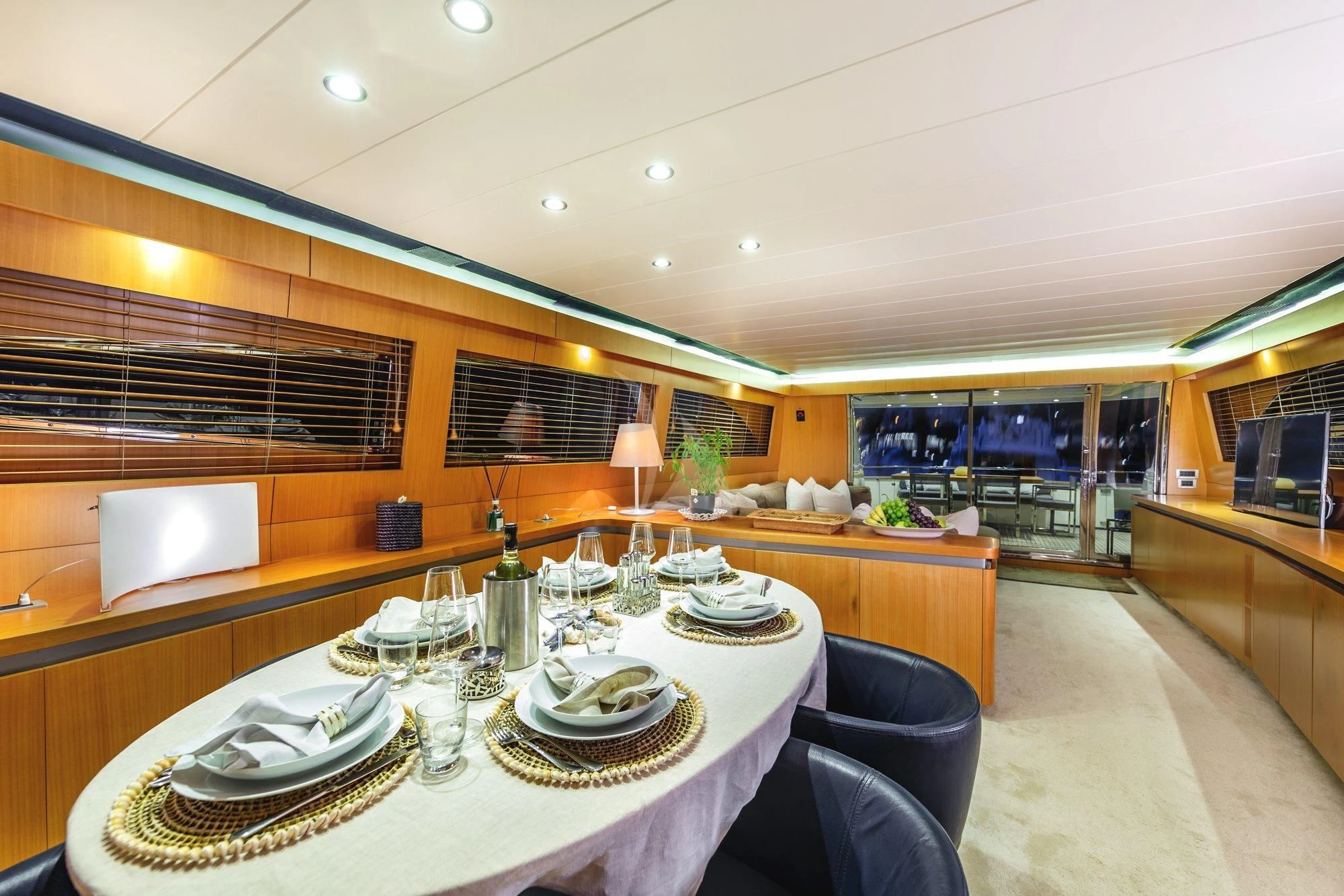 a large dining room with a large table and chairs aboard MINOU Yacht for Sale