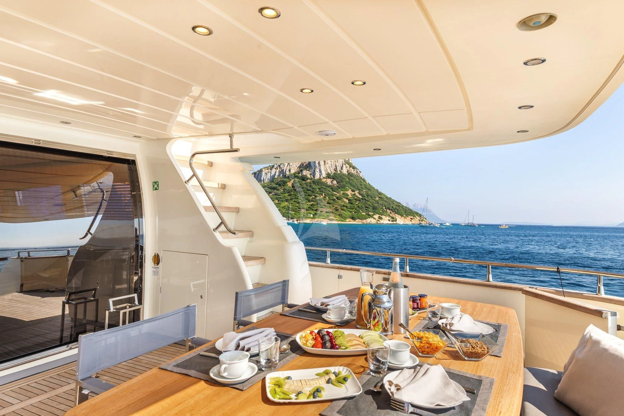 a table with food on it aboard MINOU Yacht for Sale