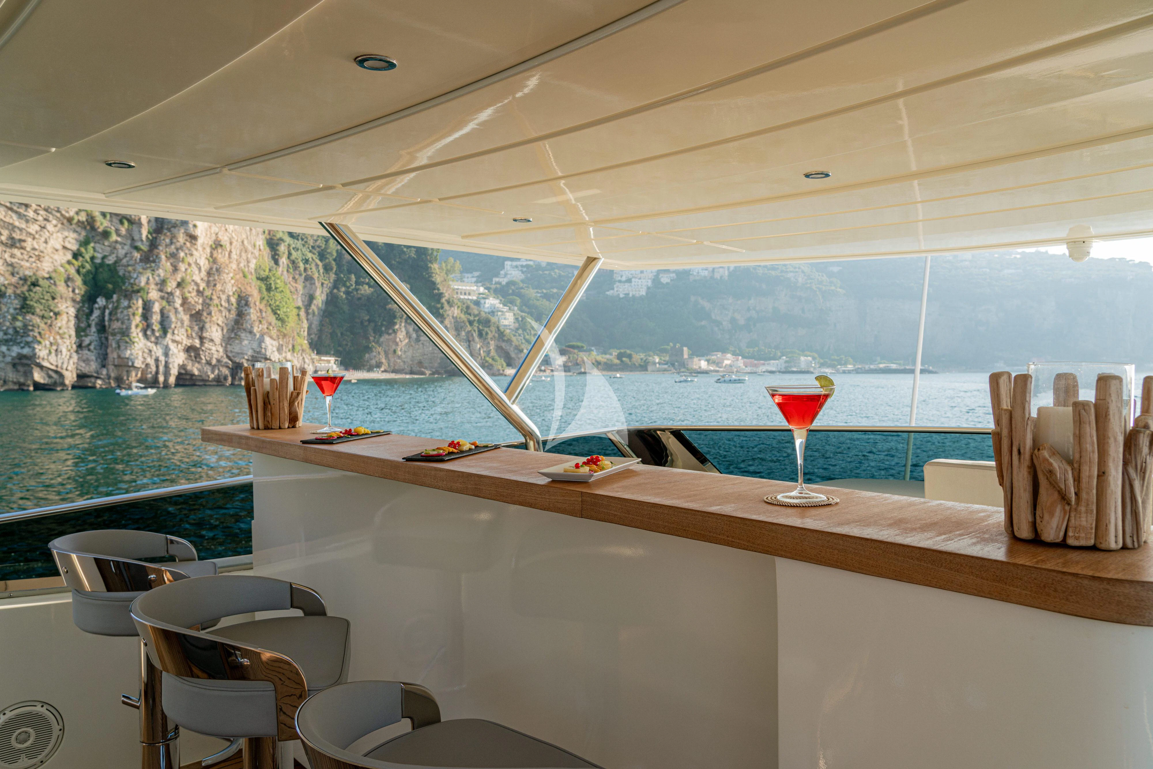 a room with a table and chairs aboard MINOU Yacht for Sale