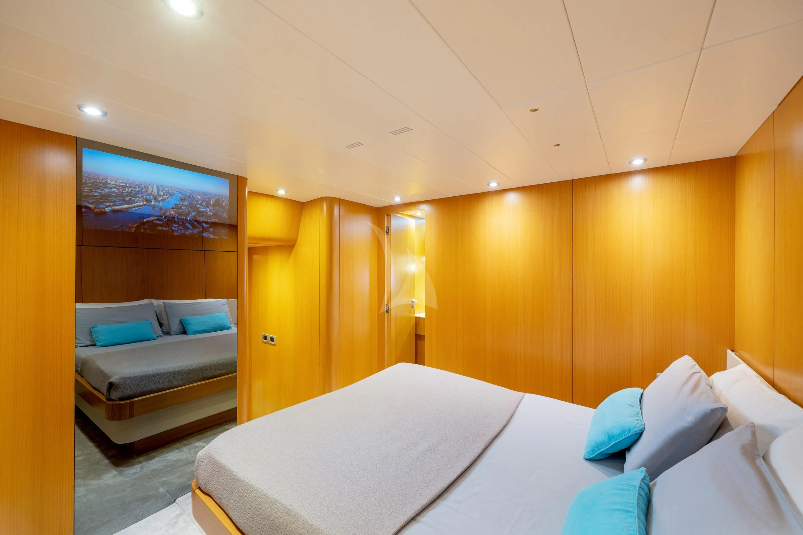 a room with a bed and a couch aboard MINOU Yacht for Sale