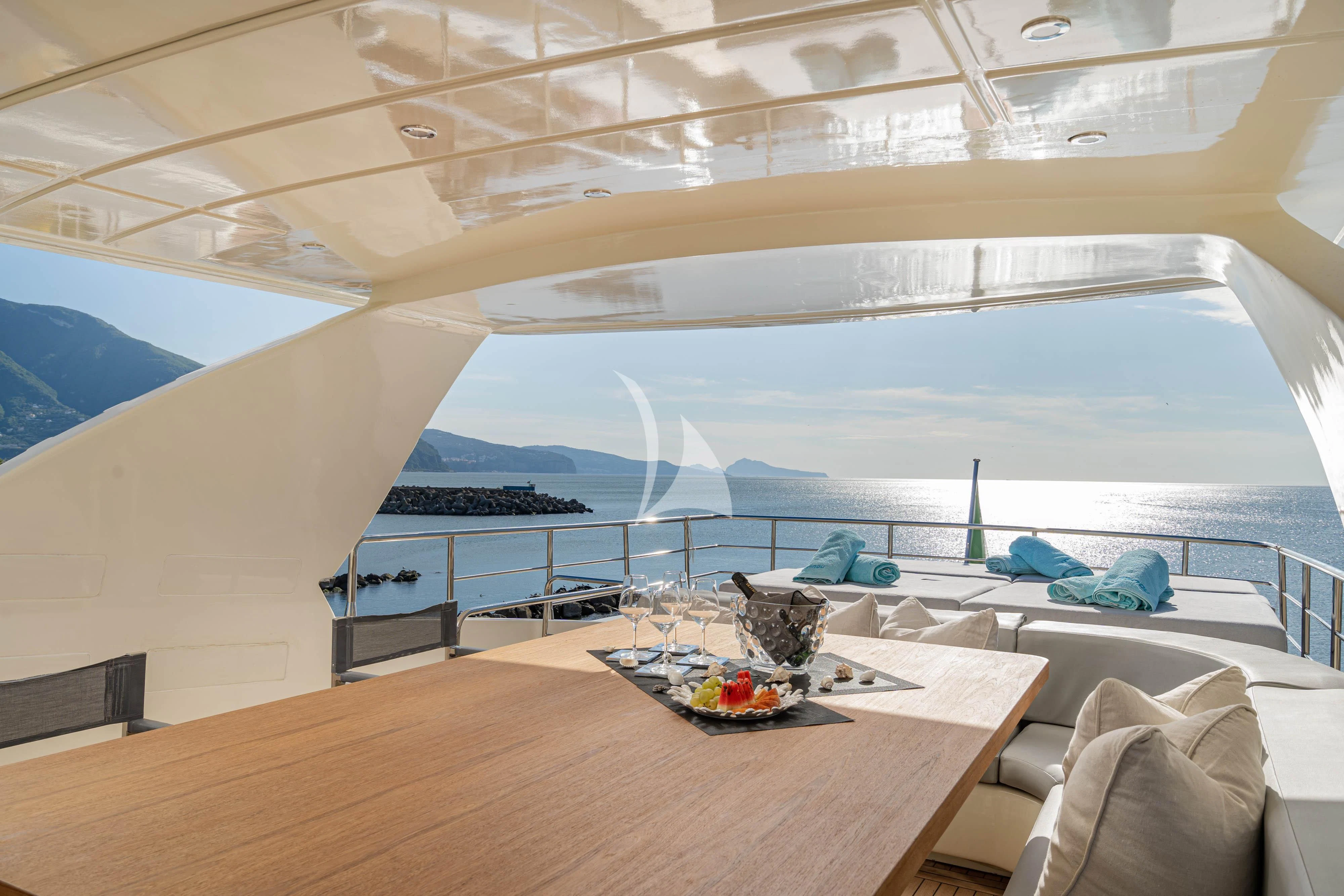a room with a table and chairs aboard MINOU Yacht for Sale