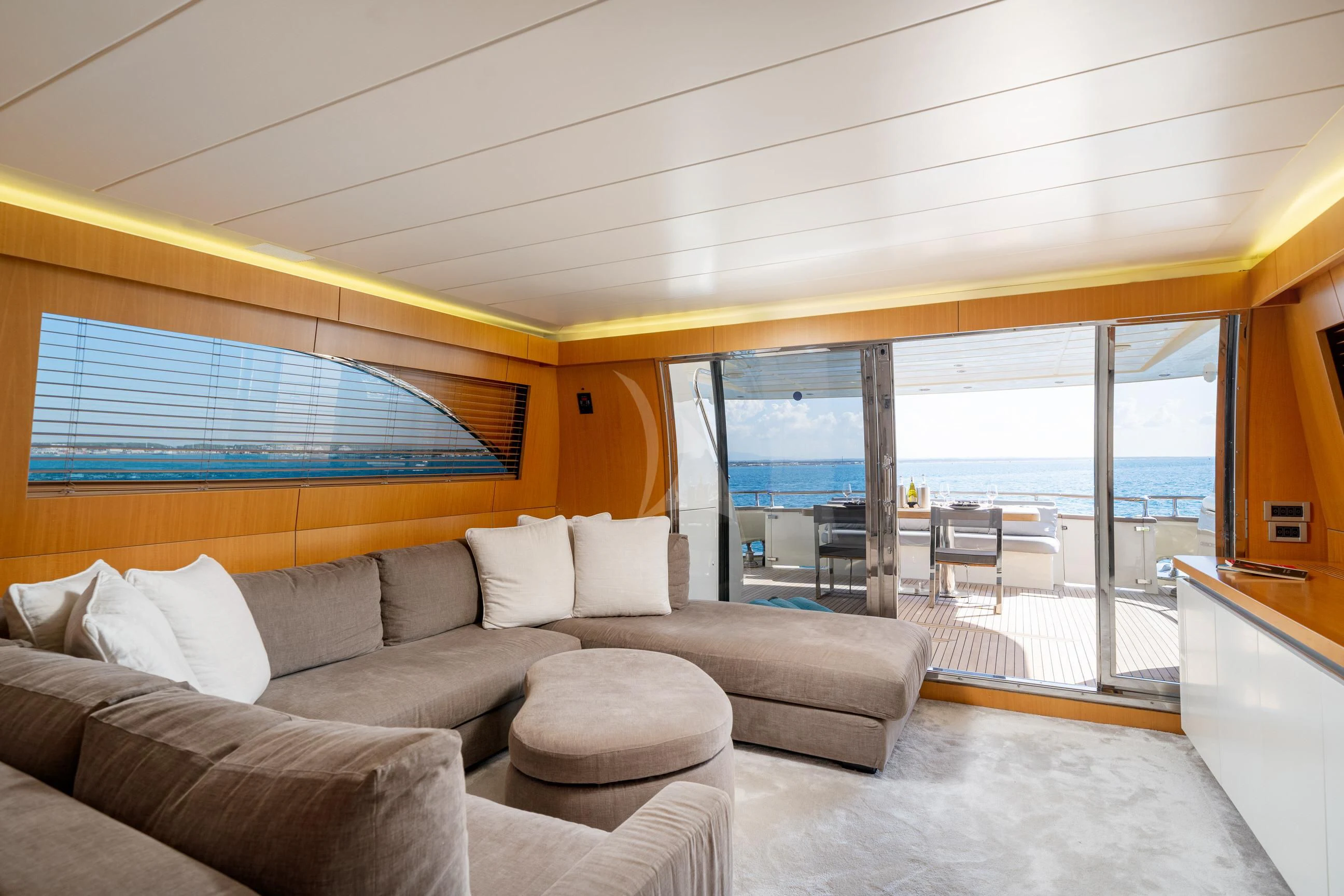 a living room with a large window aboard MINOU Yacht for Sale