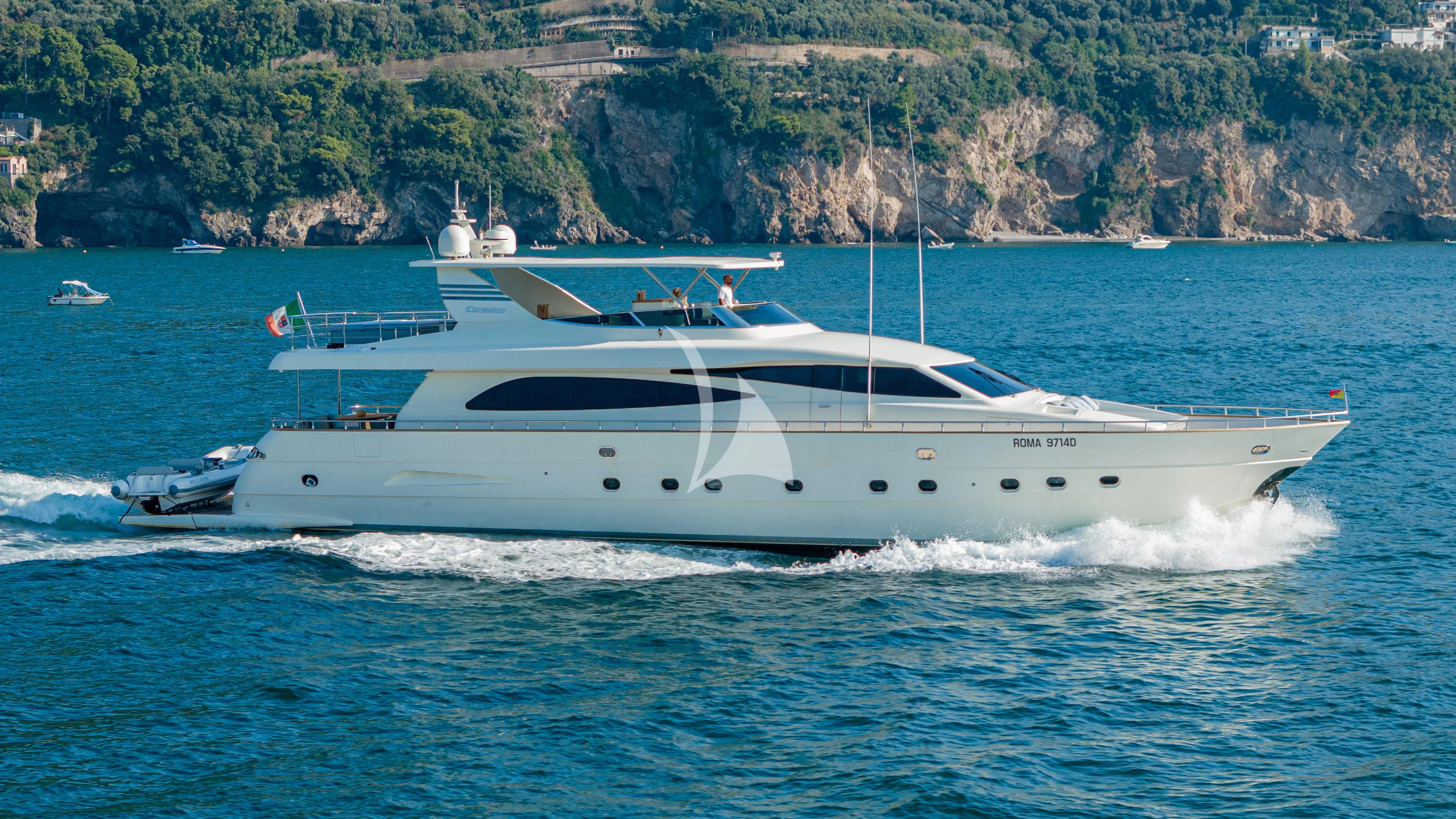 a white yacht on the water aboard MINOU Yacht for Sale