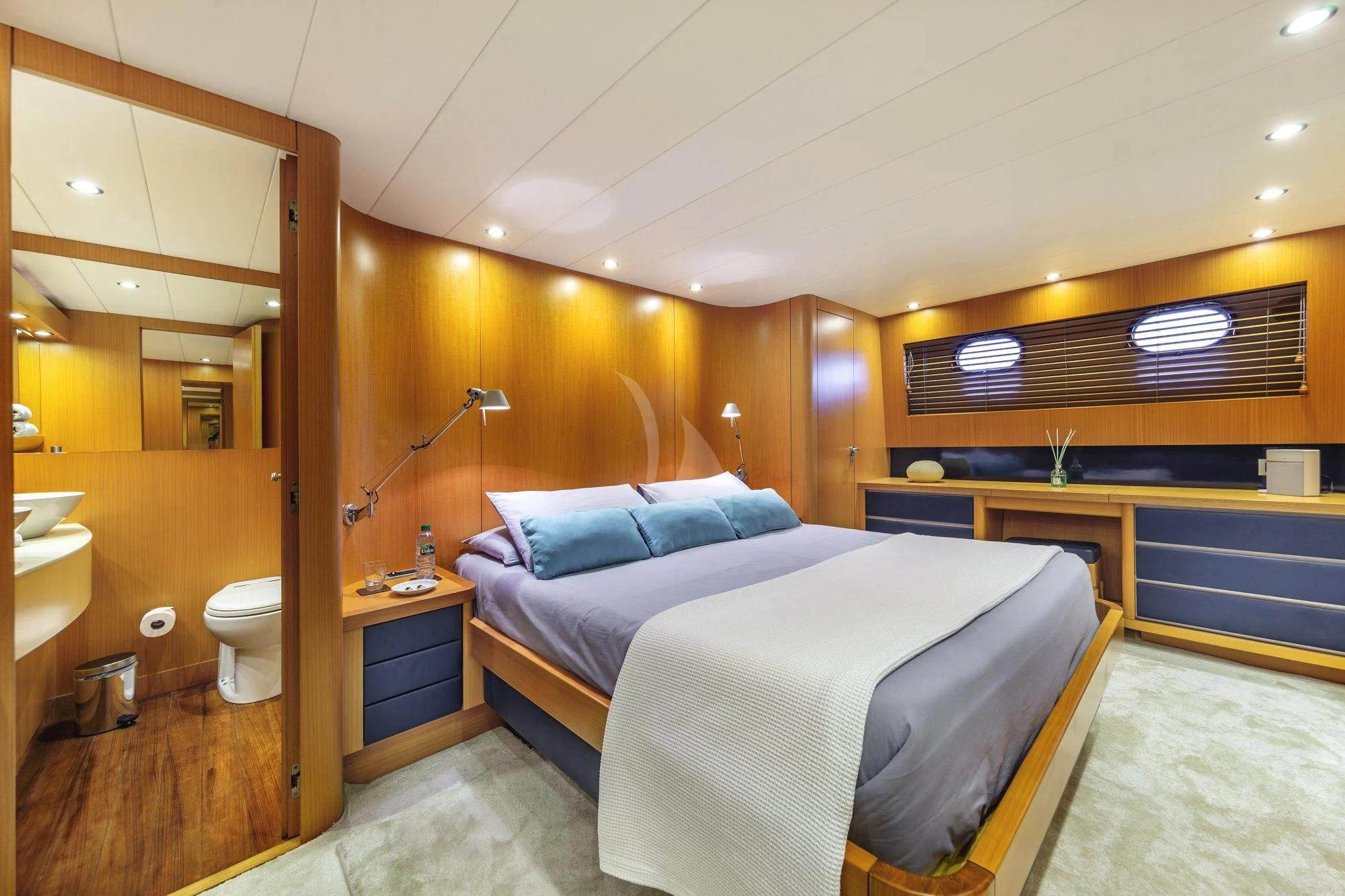 a room with a bed and a sink aboard MINOU Yacht for Sale