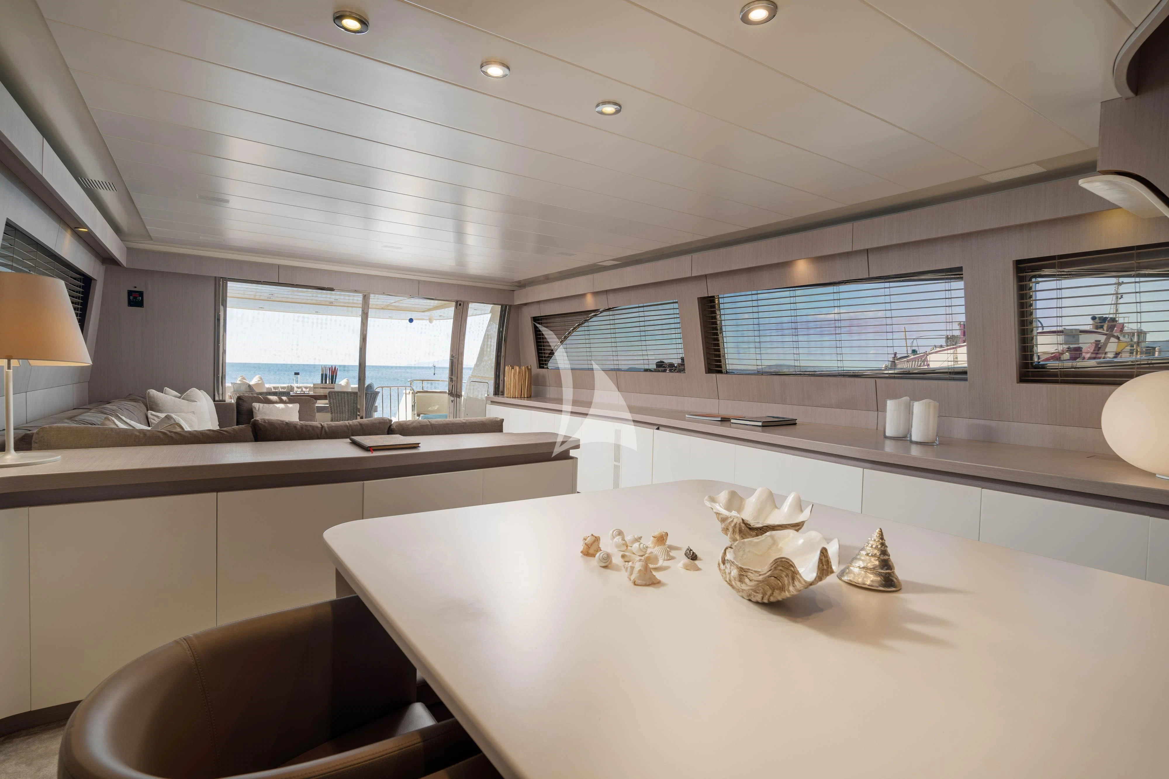 a kitchen with white counter tops aboard MINOU Yacht for Sale