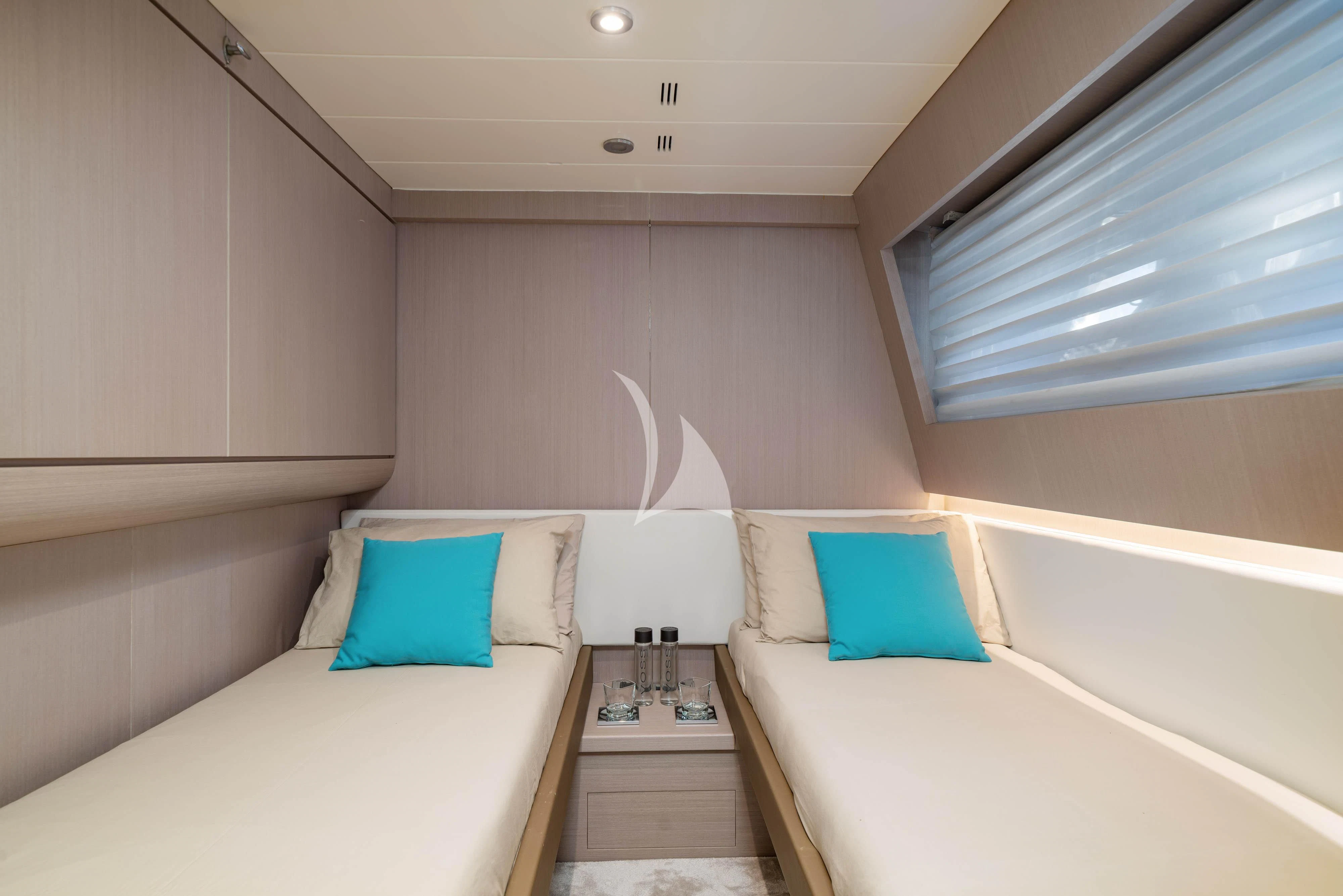 a room with a bed and a desk aboard MINOU Yacht for Sale