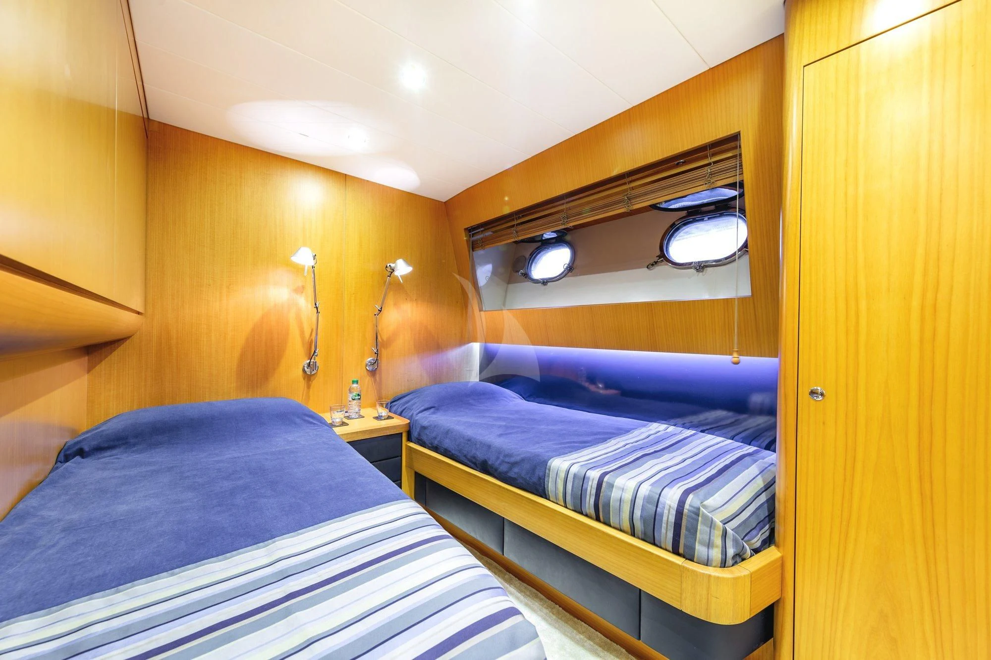 a room with two beds aboard MINOU Yacht for Sale
