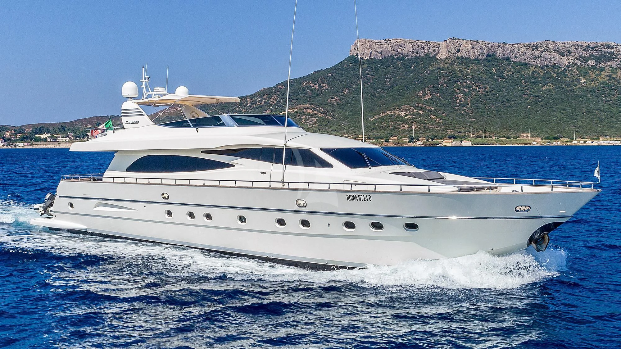 a white yacht on the water aboard MINOU Yacht for Sale