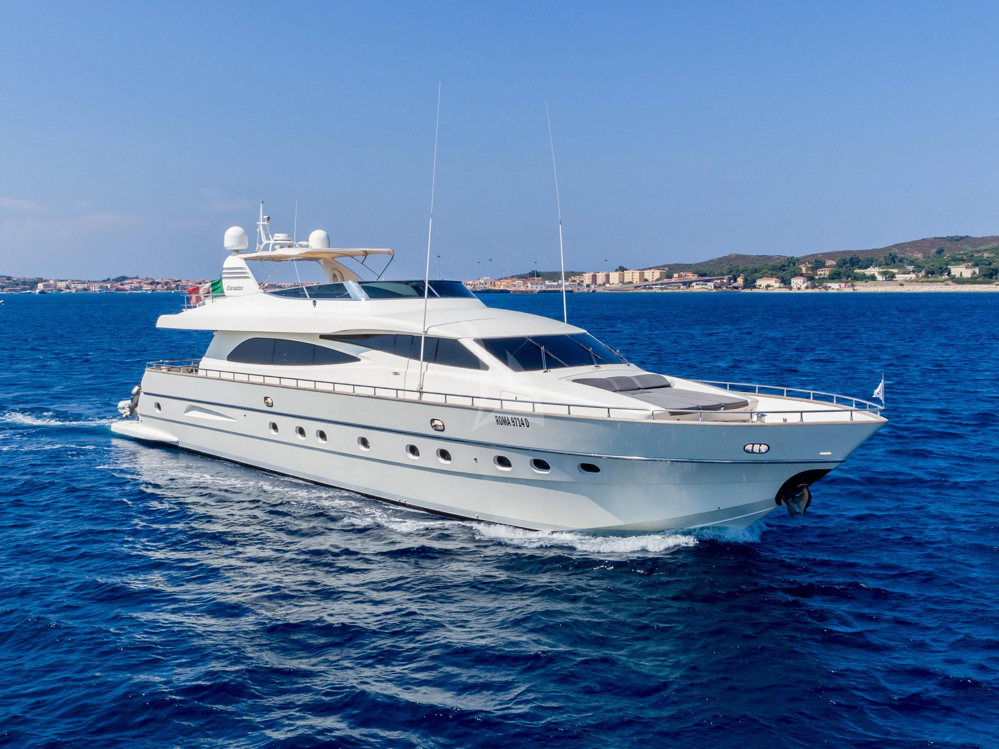 a white yacht in the water aboard MINOU Yacht for Sale