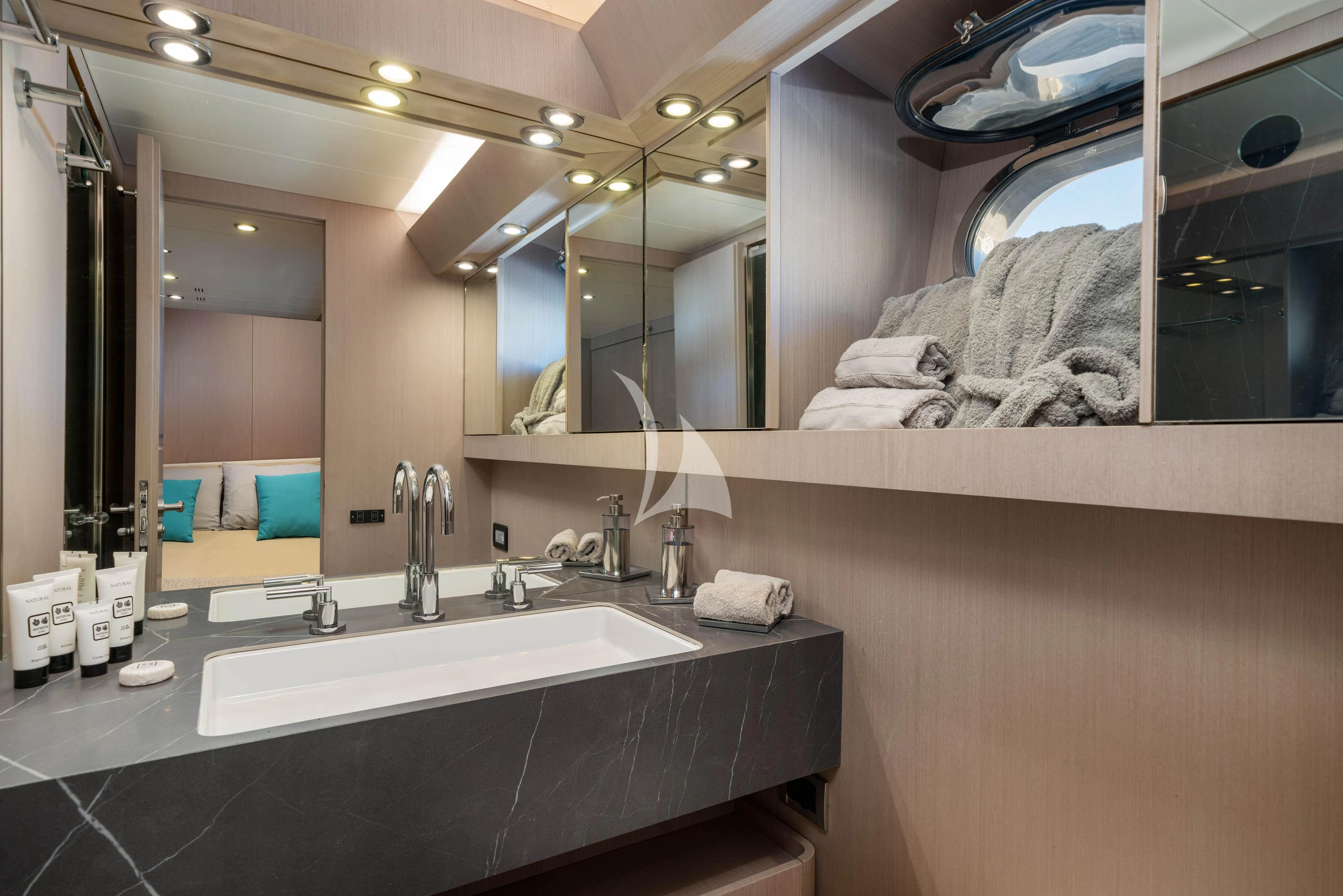 a bathroom with a large mirror aboard MINOU Yacht for Sale