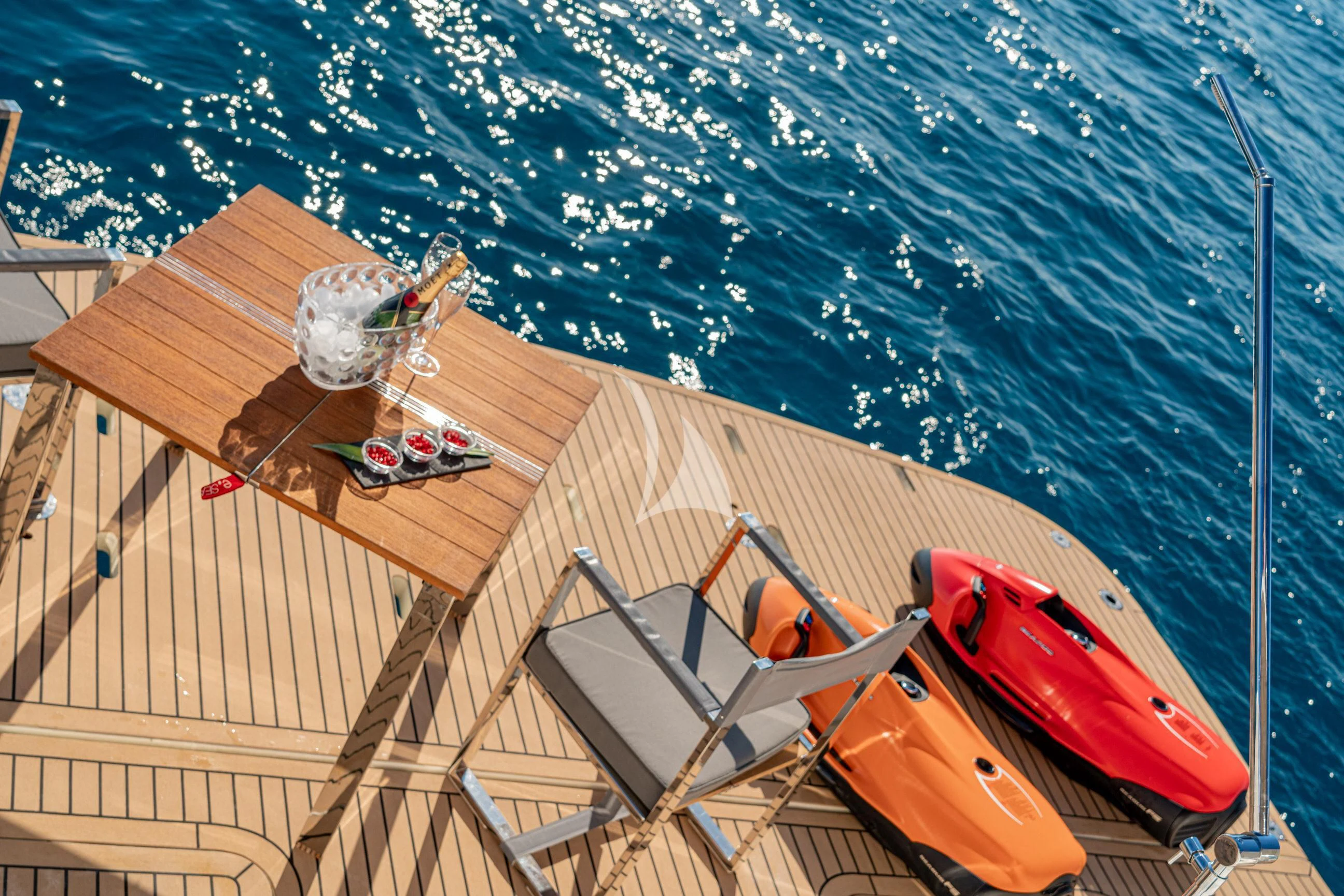 a boat with a person on it aboard MINOU Yacht for Sale