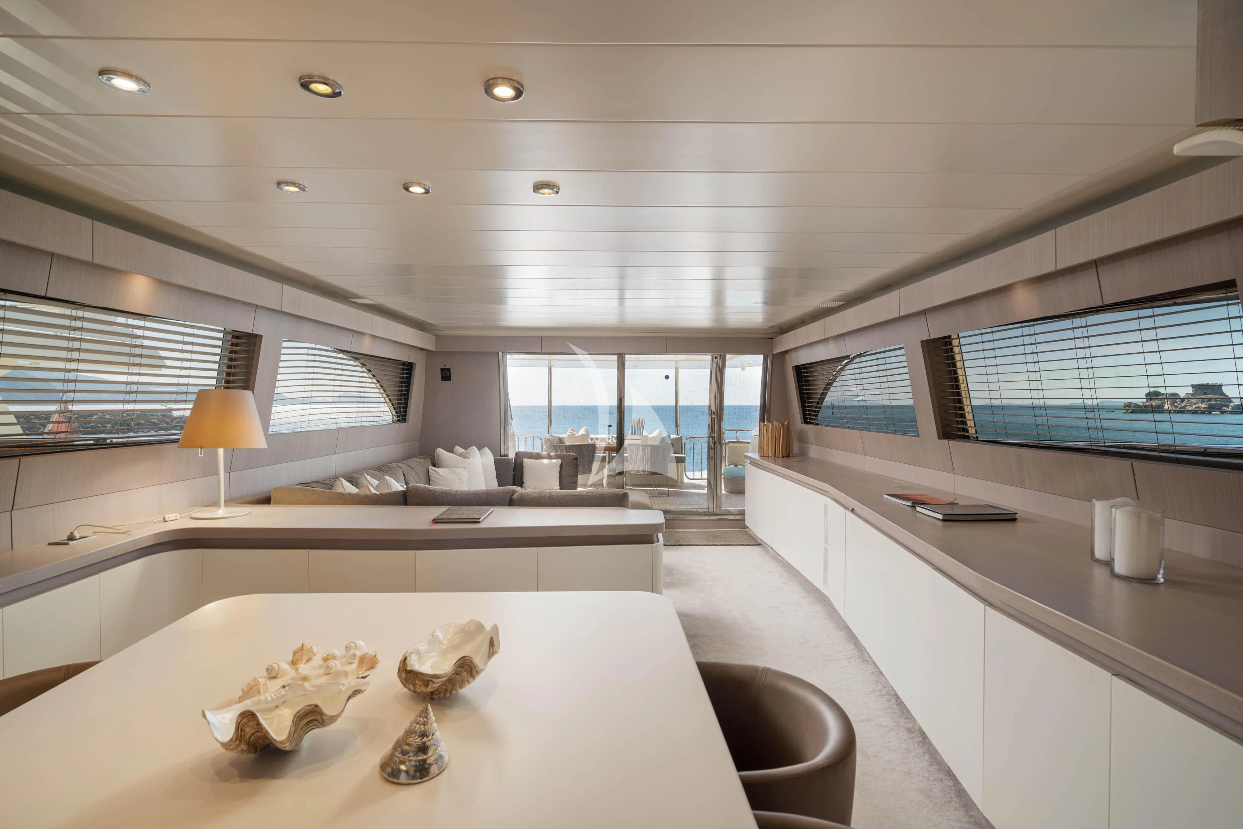 a large kitchen with a large window aboard MINOU Yacht for Sale