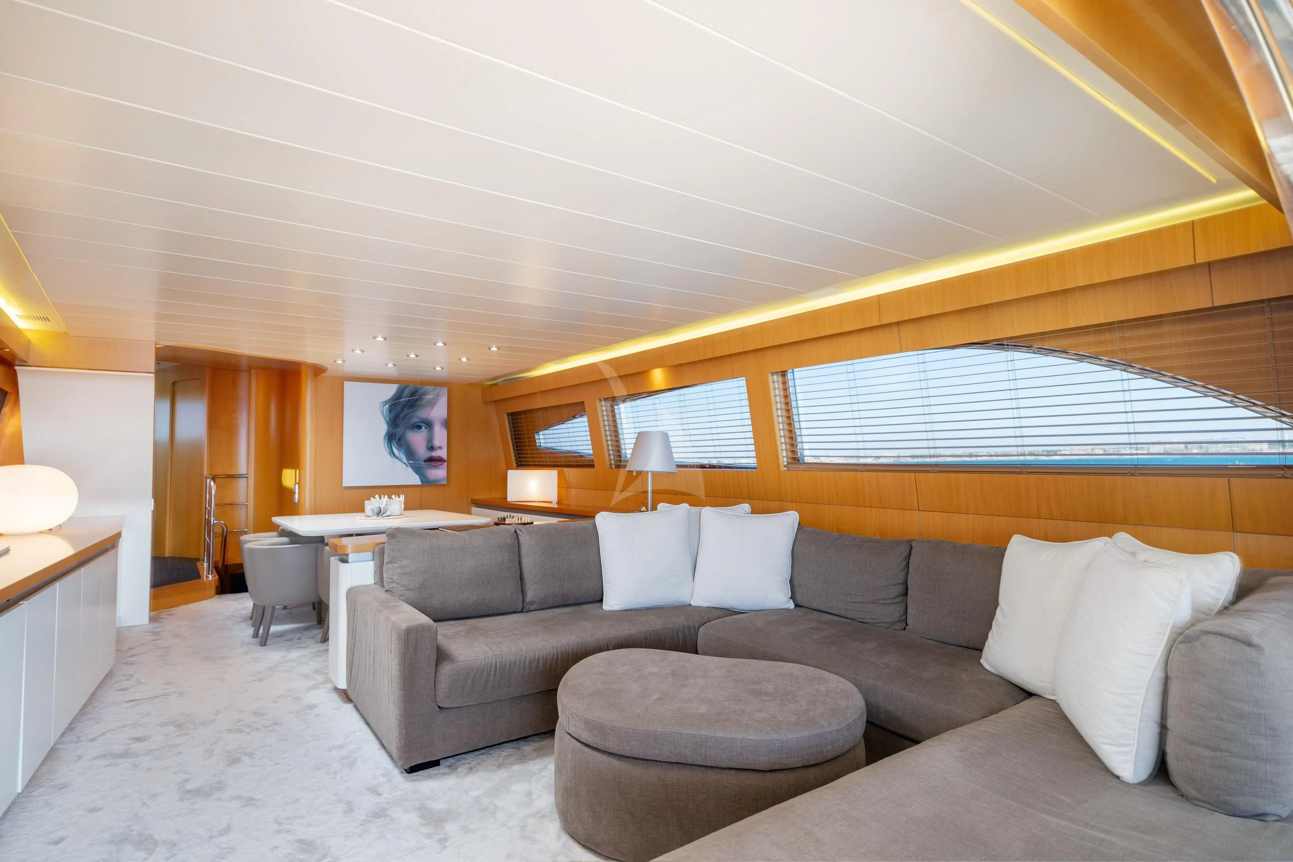 a living room with a couch and a table aboard MINOU Yacht for Sale