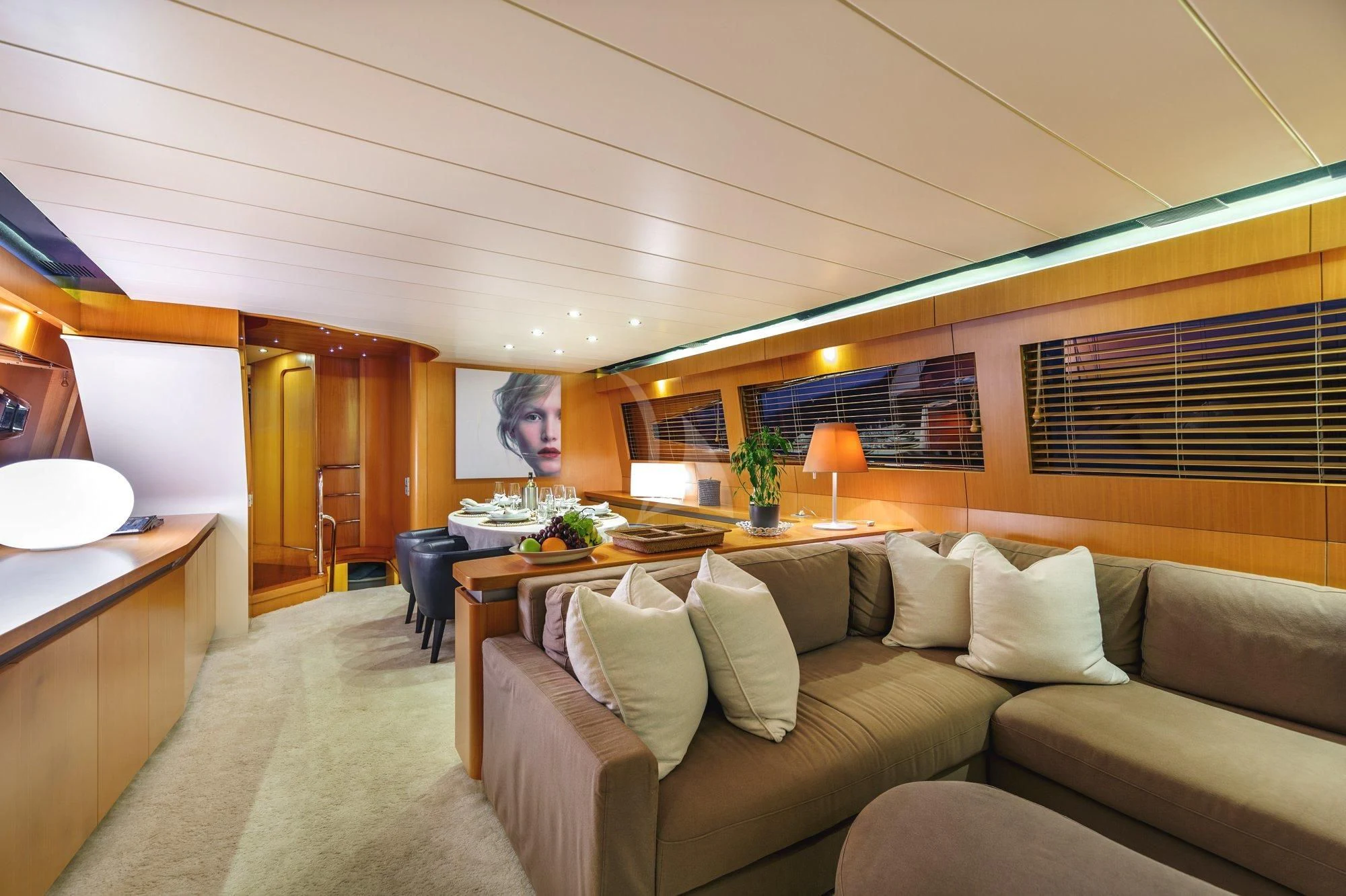 a living room with a couch and a table aboard MINOU Yacht for Sale