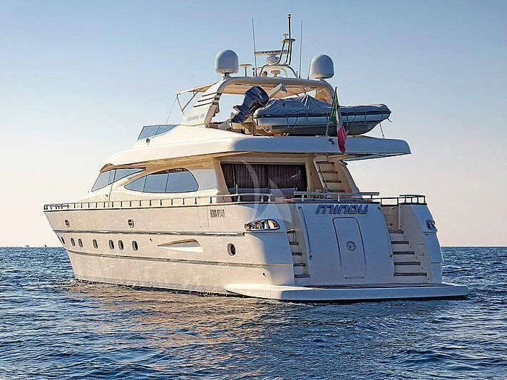 a large white boat in the water aboard MINOU Yacht for Sale