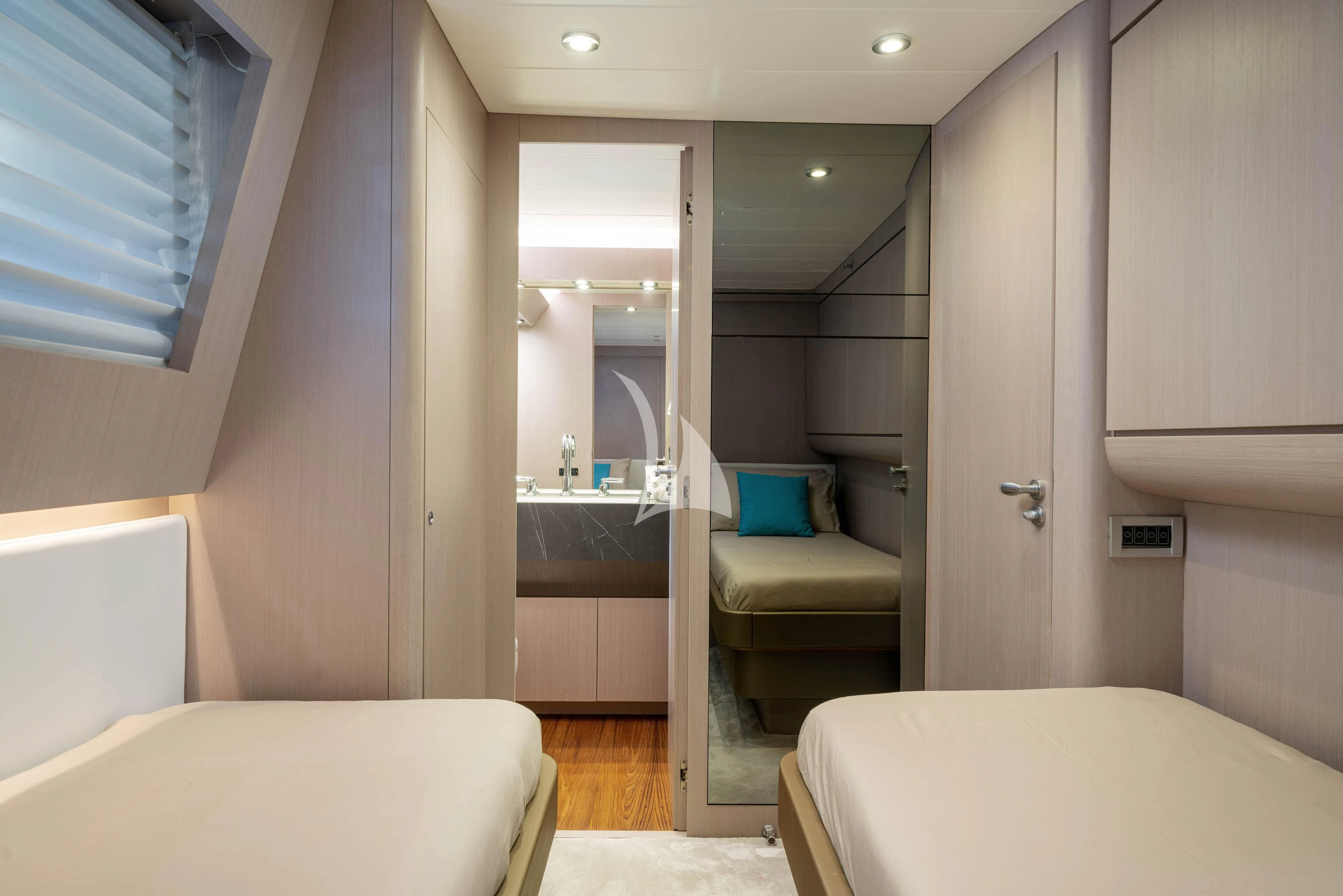 a bathroom with a tub sink and a mirror aboard MINOU Yacht for Sale