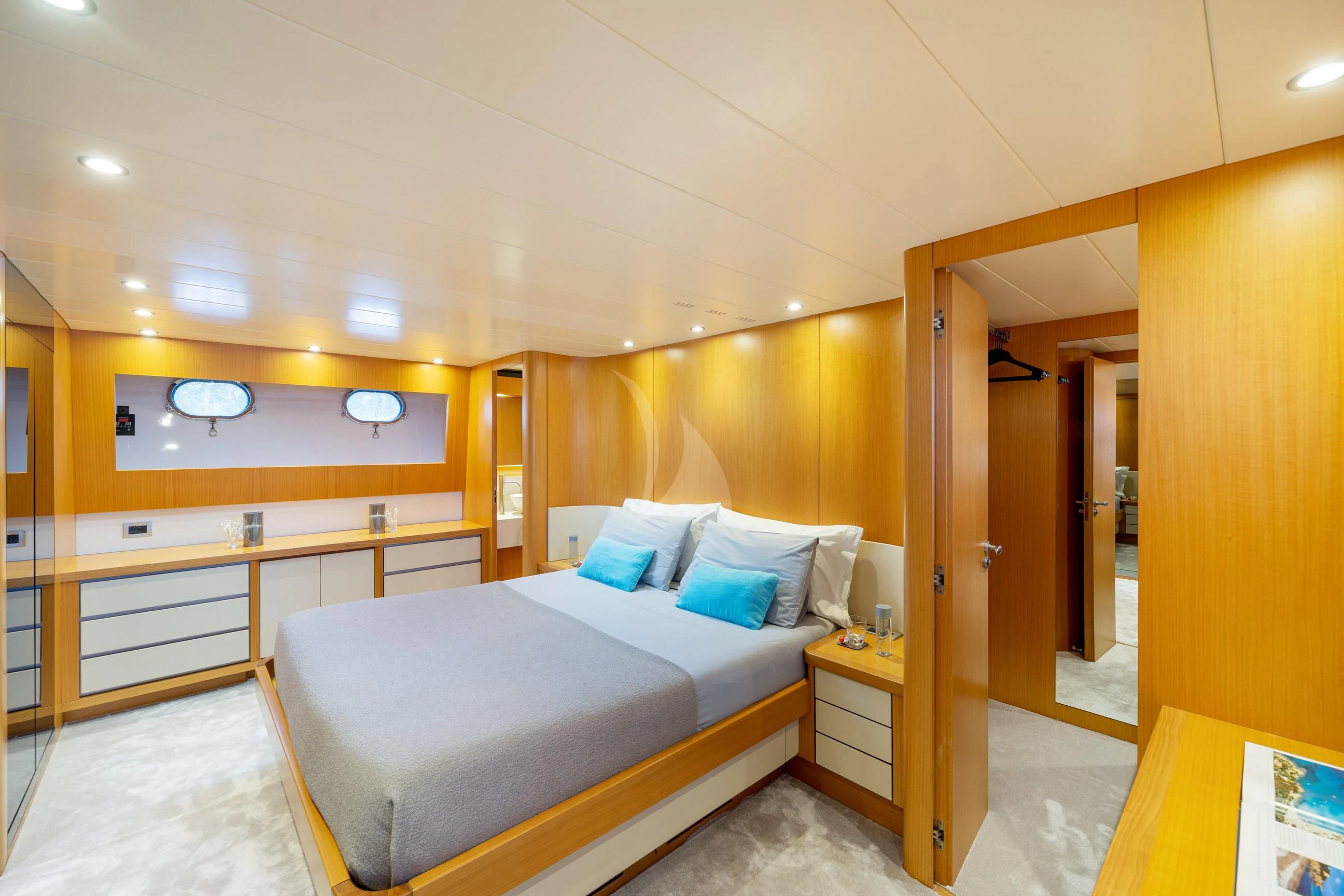 a room with a bed and a desk aboard MINOU Yacht for Sale