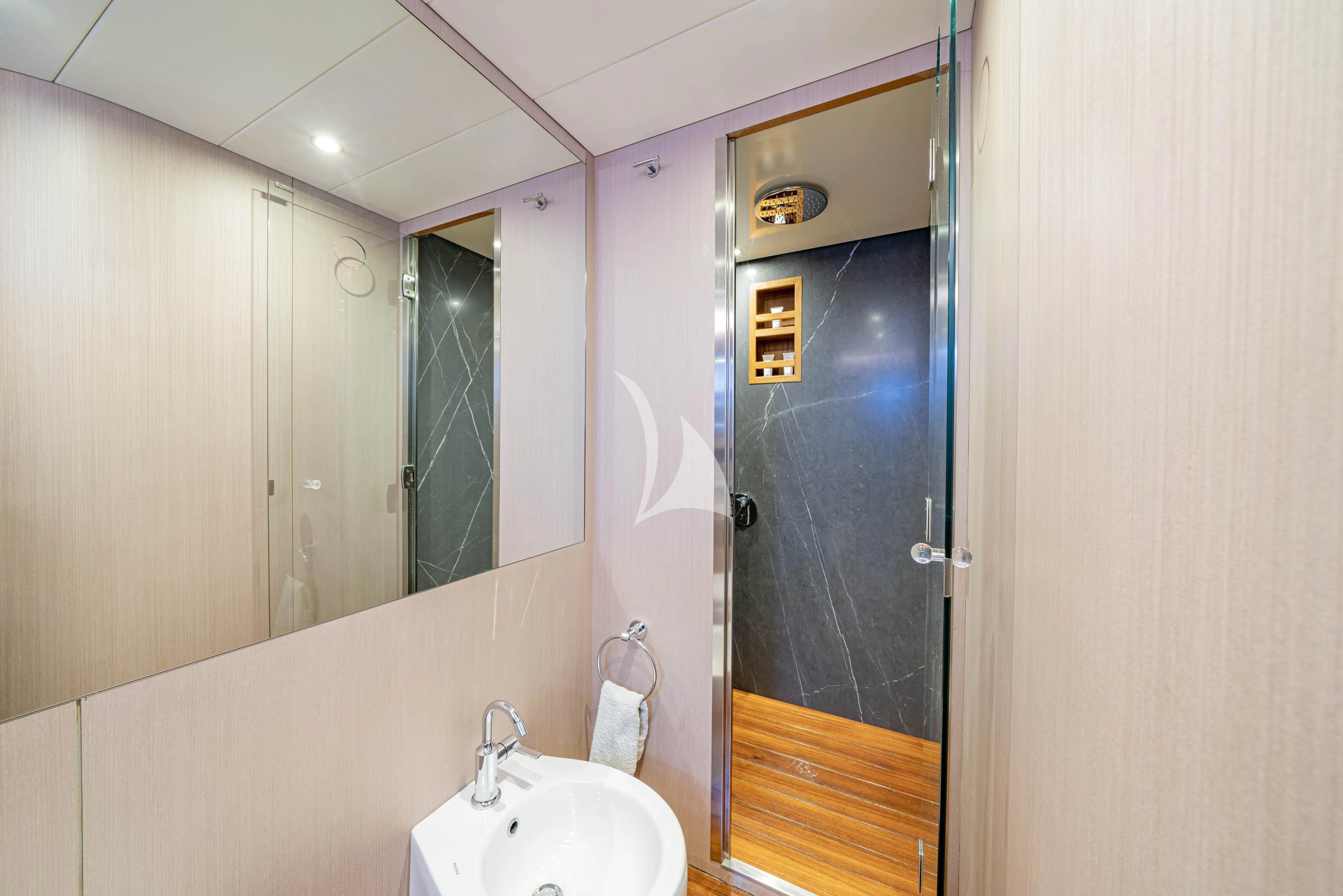 a bathroom with a sink and a mirror aboard MINOU Yacht for Sale