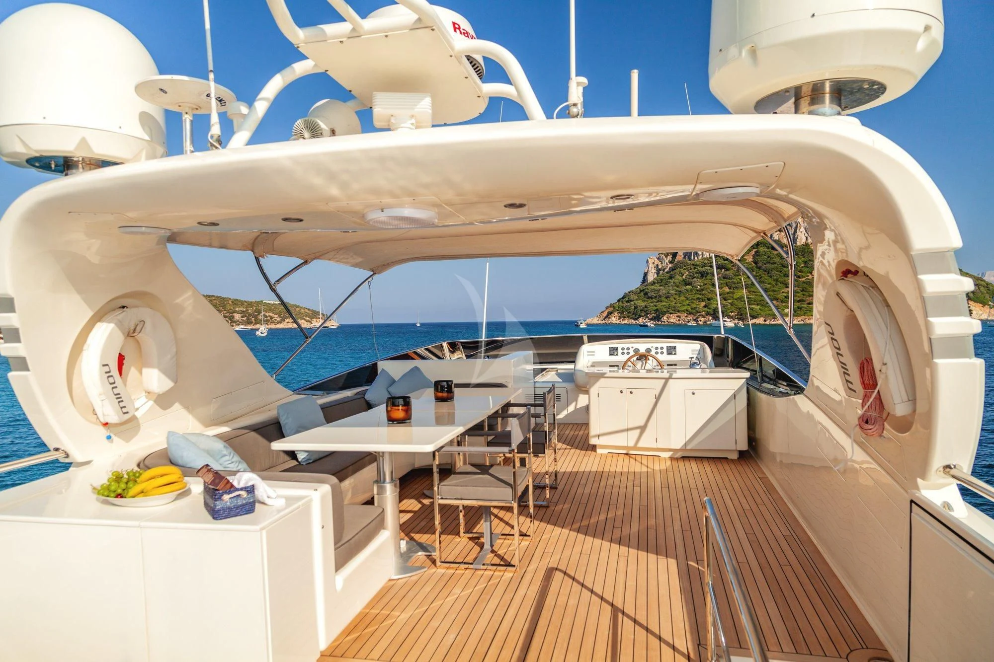 a white satellite dish on a deck aboard MINOU Yacht for Sale