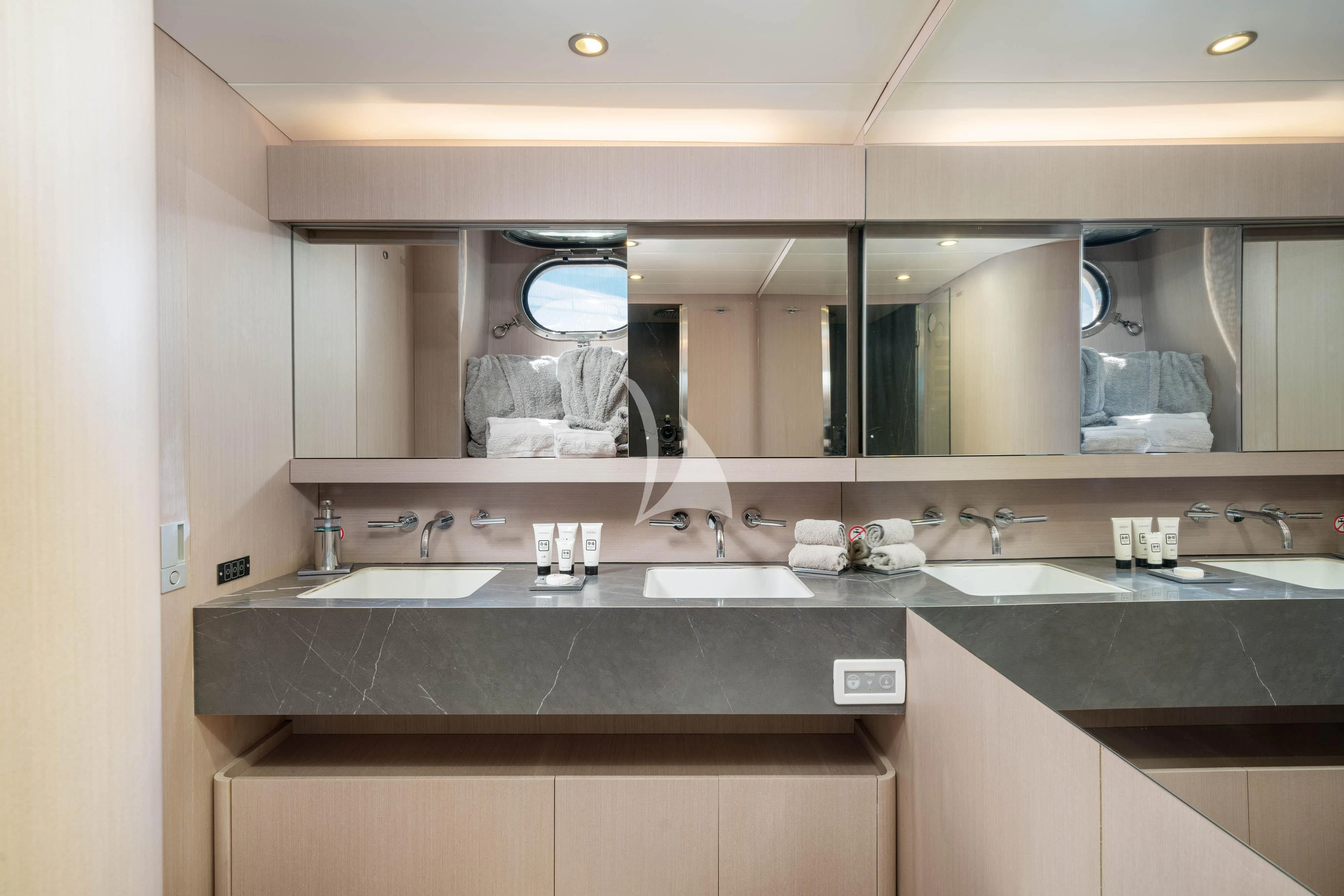 a bathroom with sinks and mirrors aboard MINOU Yacht for Sale