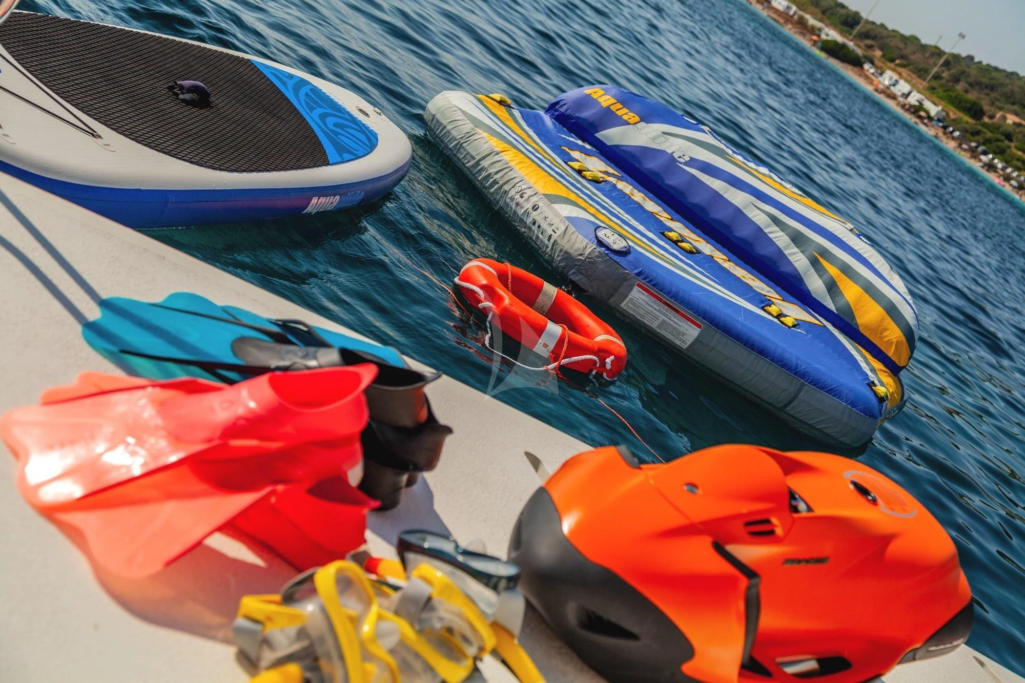 a group of kayaks on a blue surface aboard MINOU Yacht for Sale