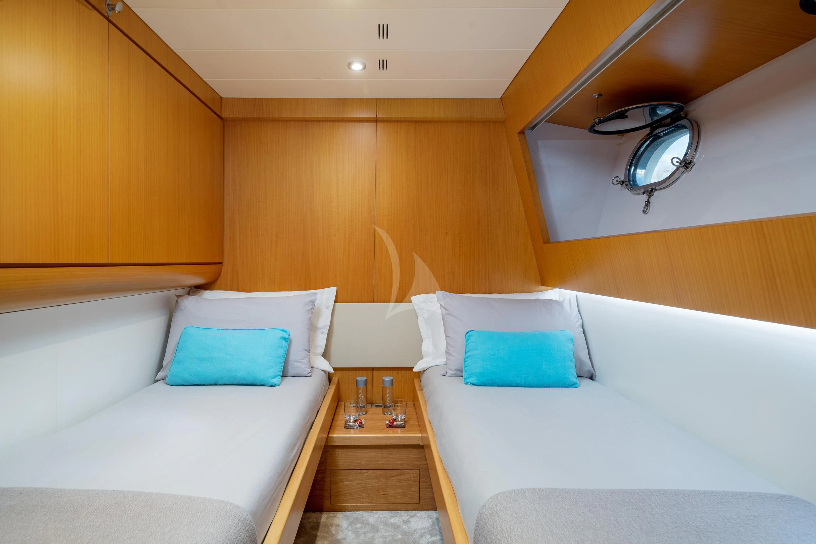 a room with two beds aboard MINOU Yacht for Sale