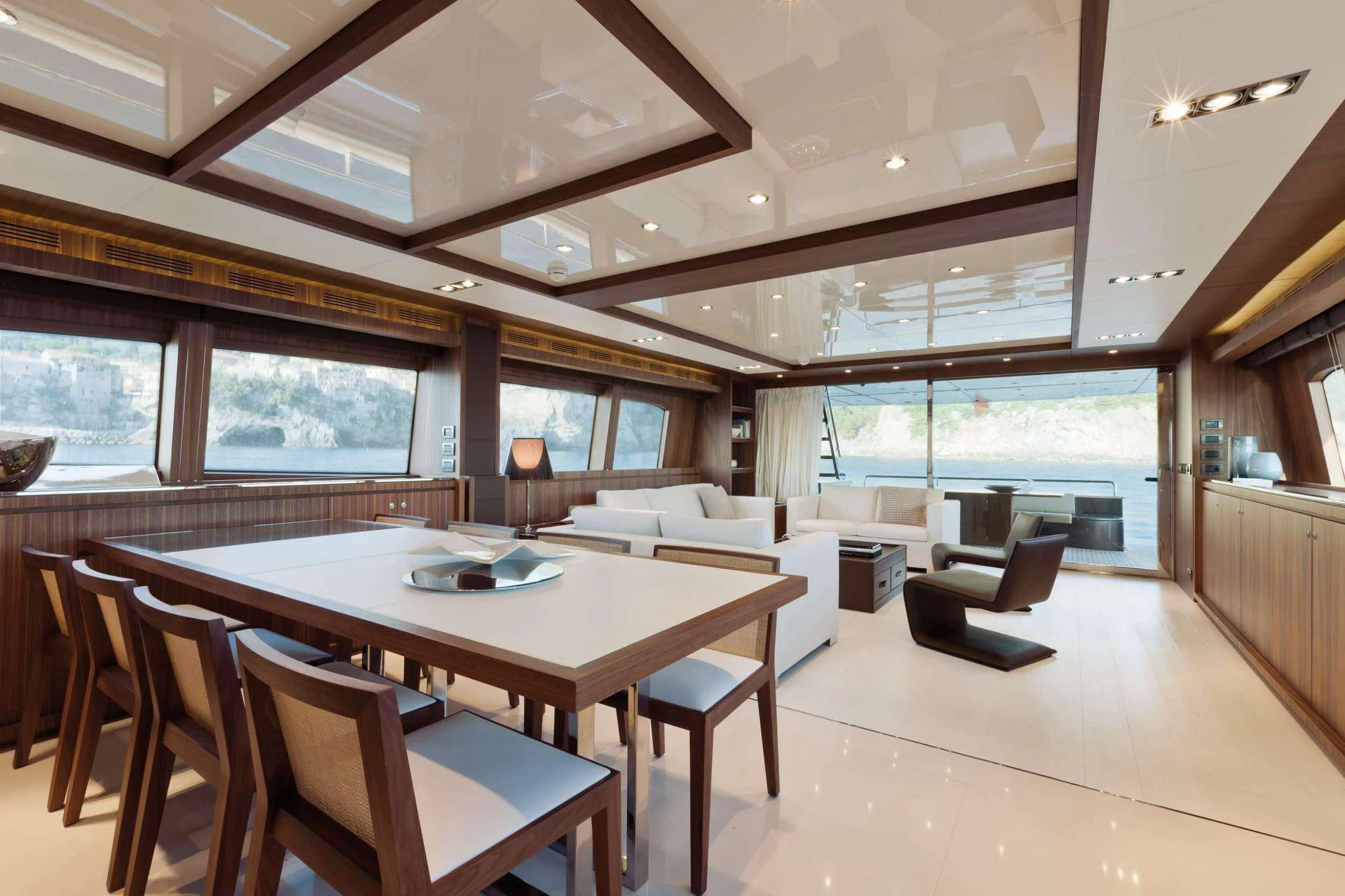 a large dining room with a large open window aboard PRIVILEGIO Yacht for Sale