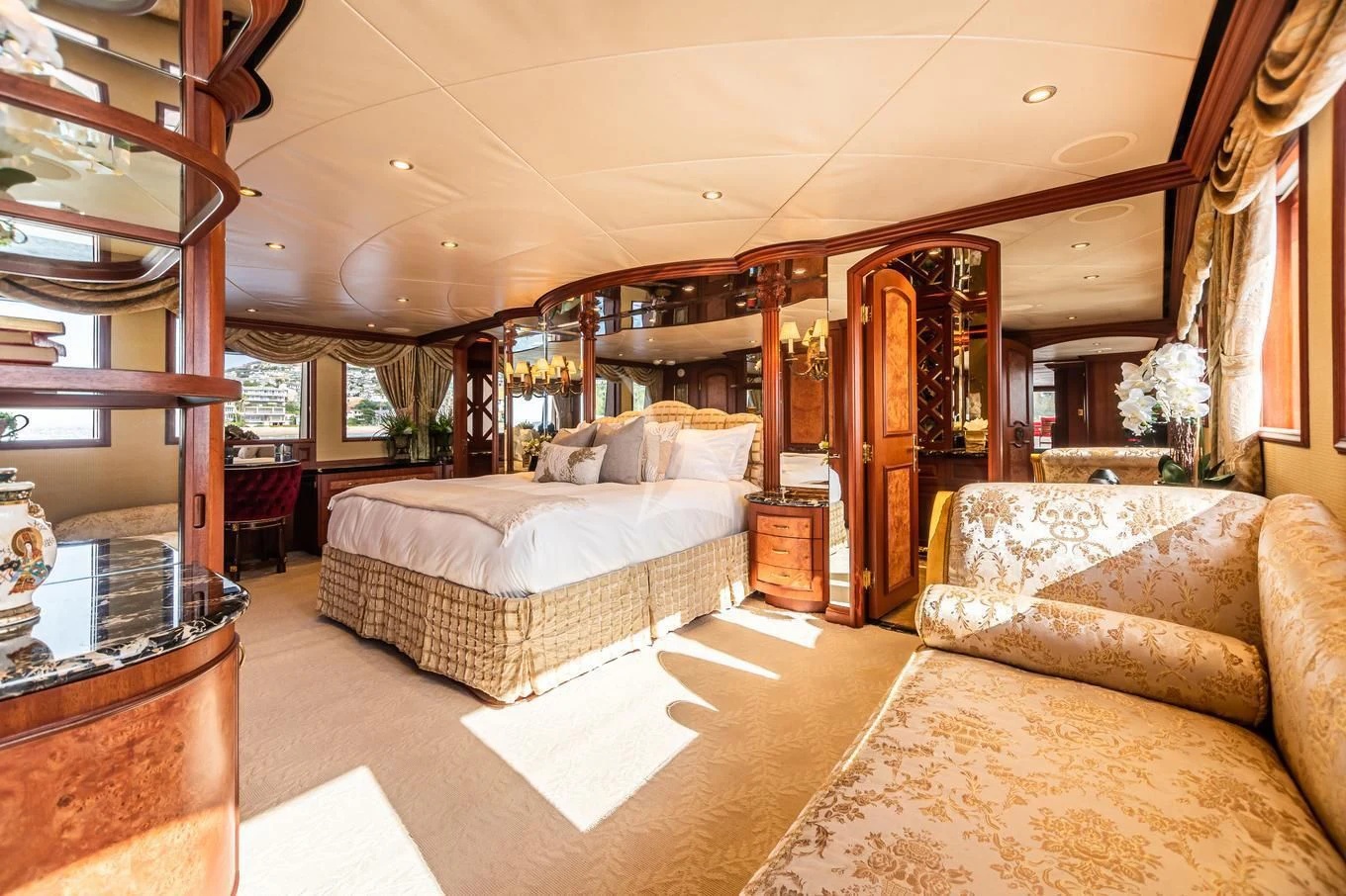 a large bedroom with a large bed aboard SHOGUN Yacht for Sale