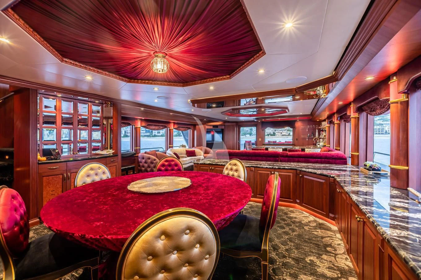 a restaurant with a table and chairs aboard SHOGUN Yacht for Sale