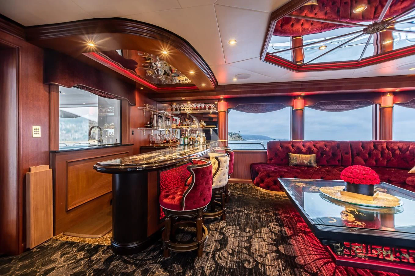 a room with a table and chairs aboard SHOGUN Yacht for Sale