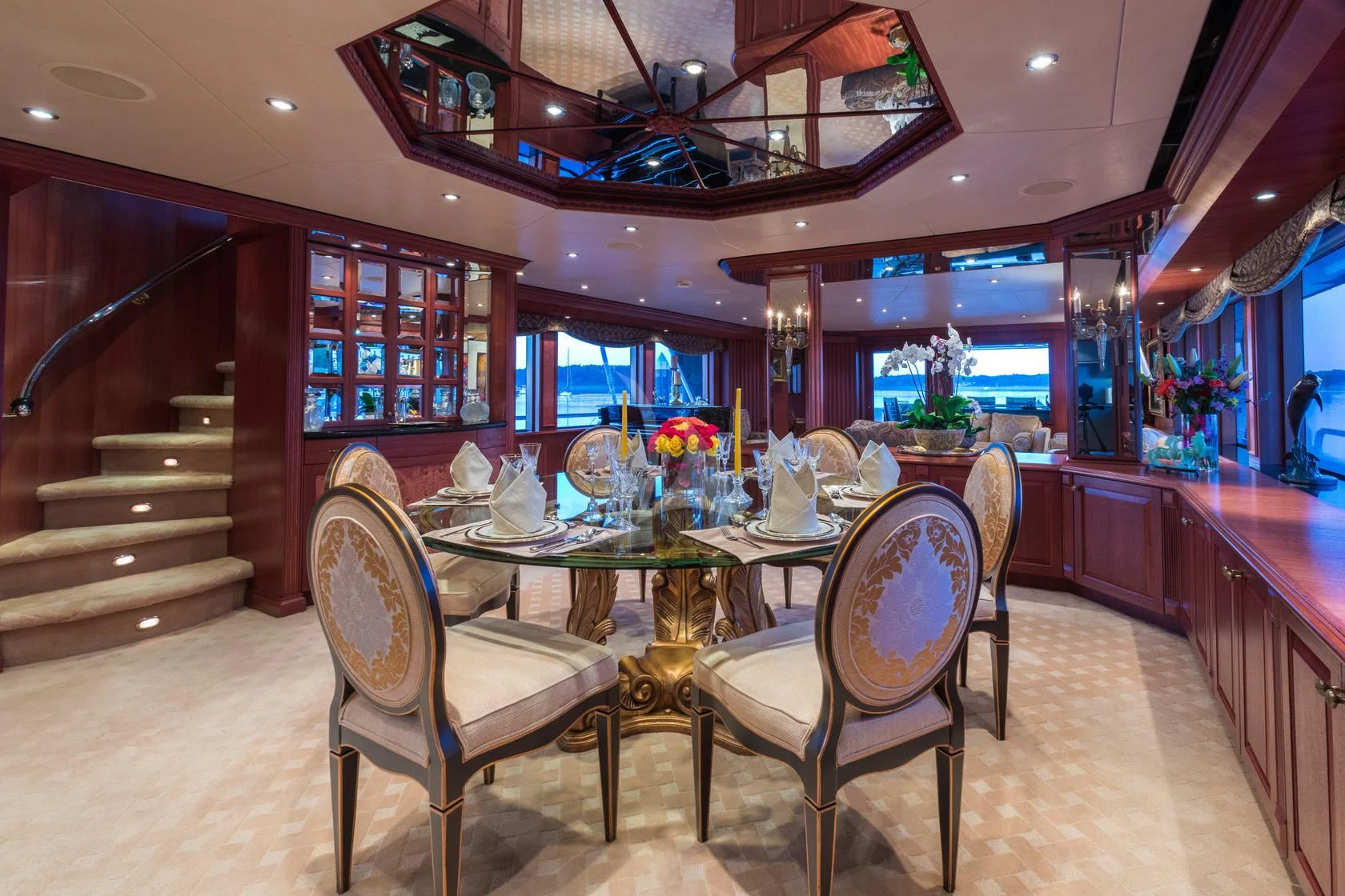 a dining room with a table and chairs aboard SHOGUN Yacht for Sale
