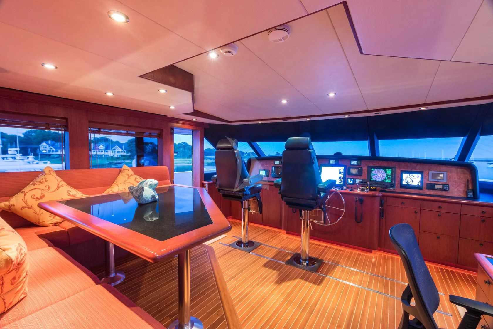 a room with a table and chairs aboard SHOGUN Yacht for Sale