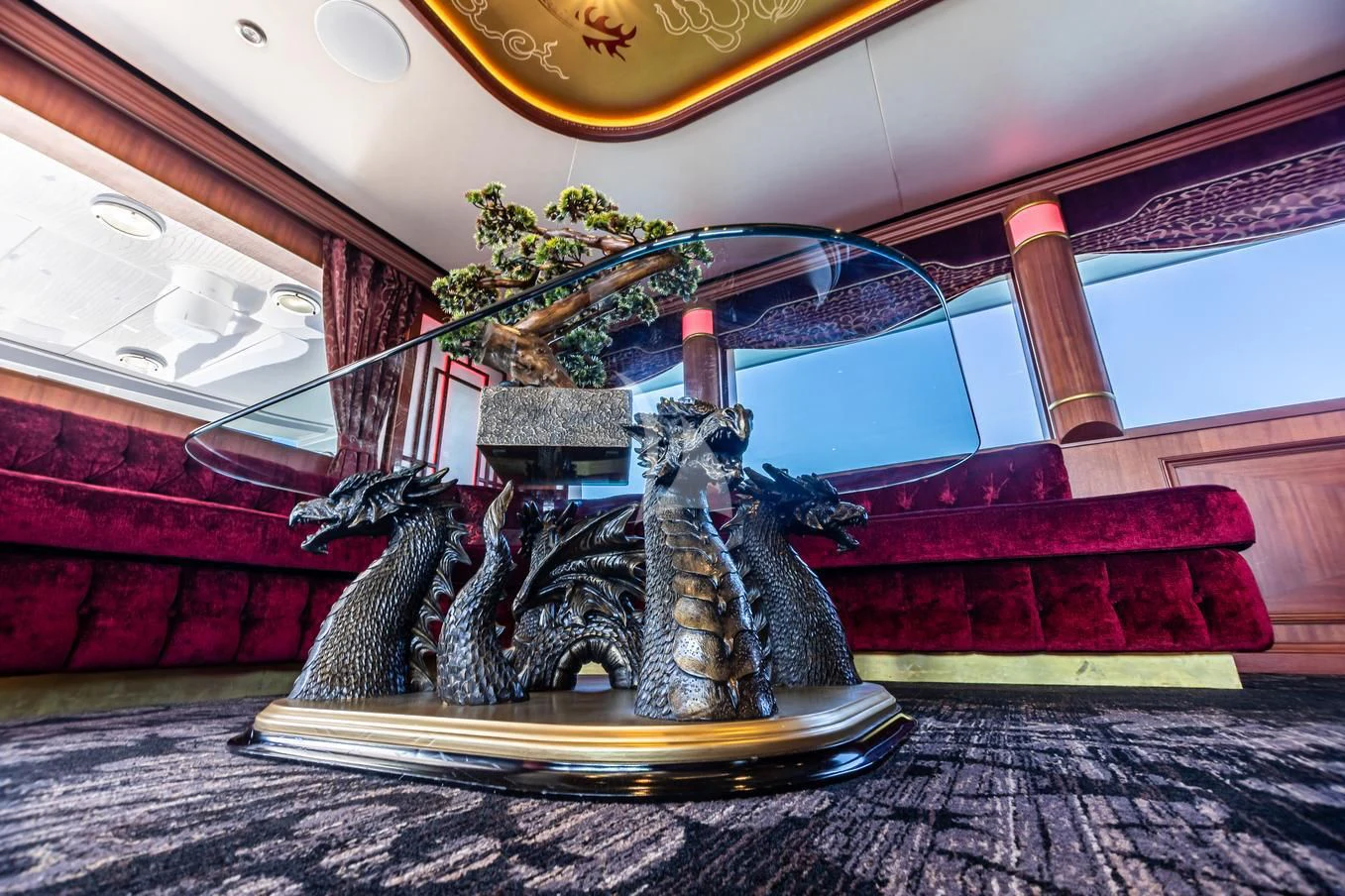 a statue of a man and a woman on a boat aboard SHOGUN Yacht for Sale