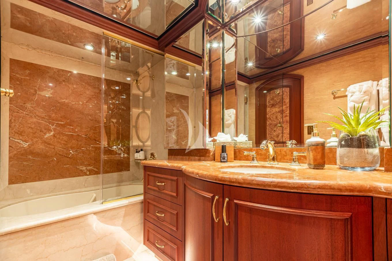 a bathroom with a large mirror aboard SHOGUN Yacht for Sale