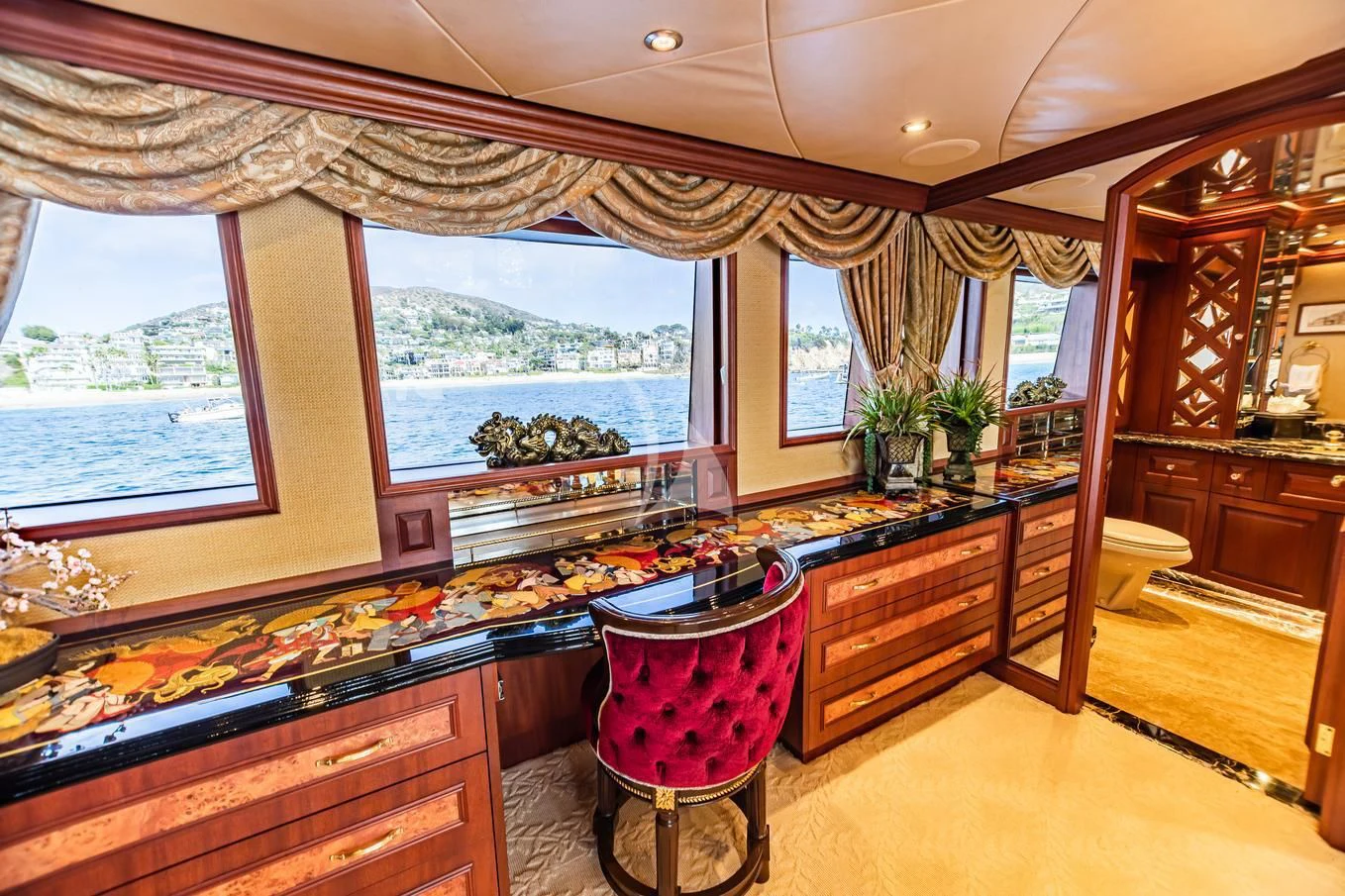 a large kitchen with a large window aboard SHOGUN Yacht for Sale