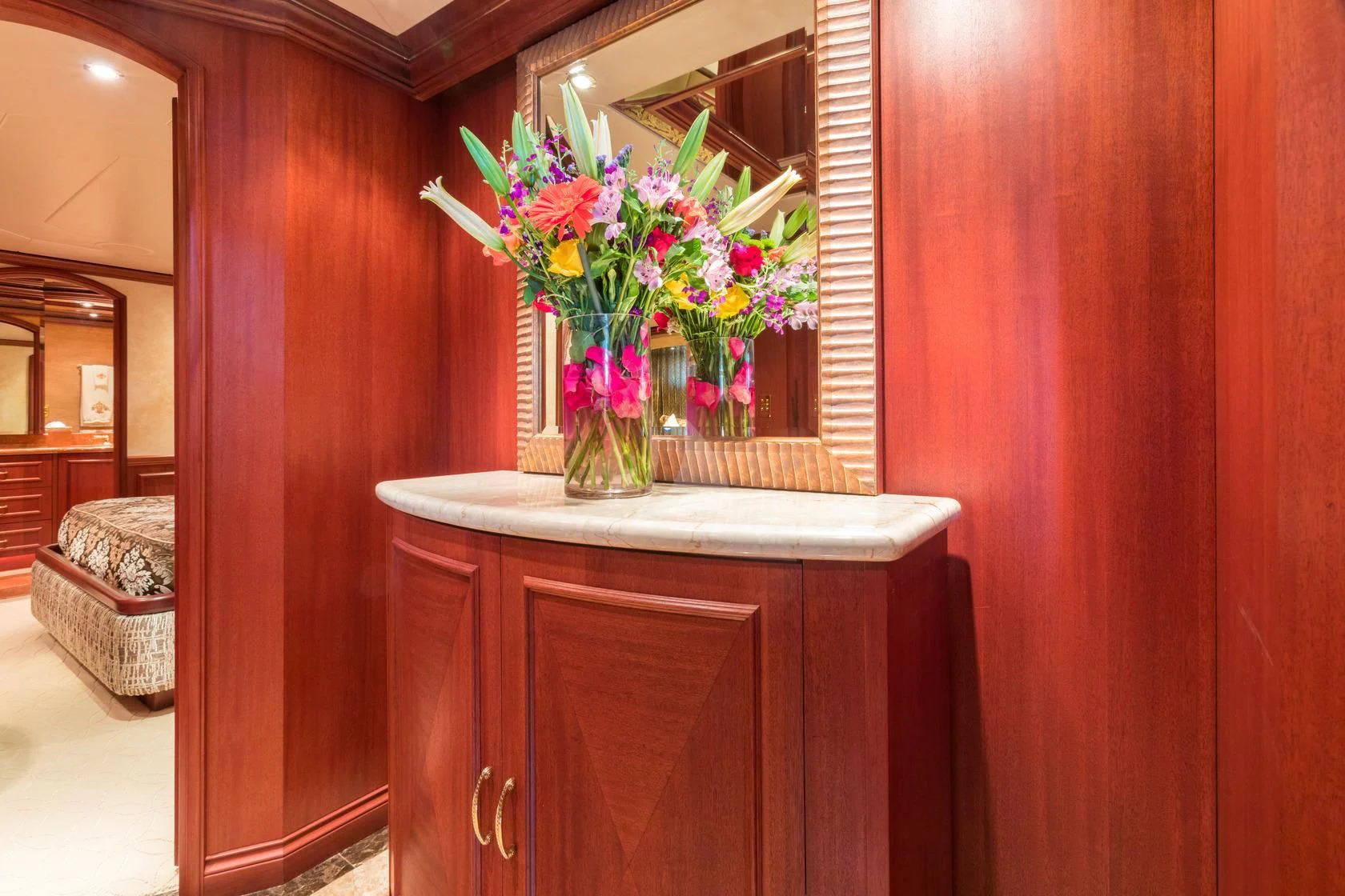 a vase of flowers on a table aboard SHOGUN Yacht for Sale