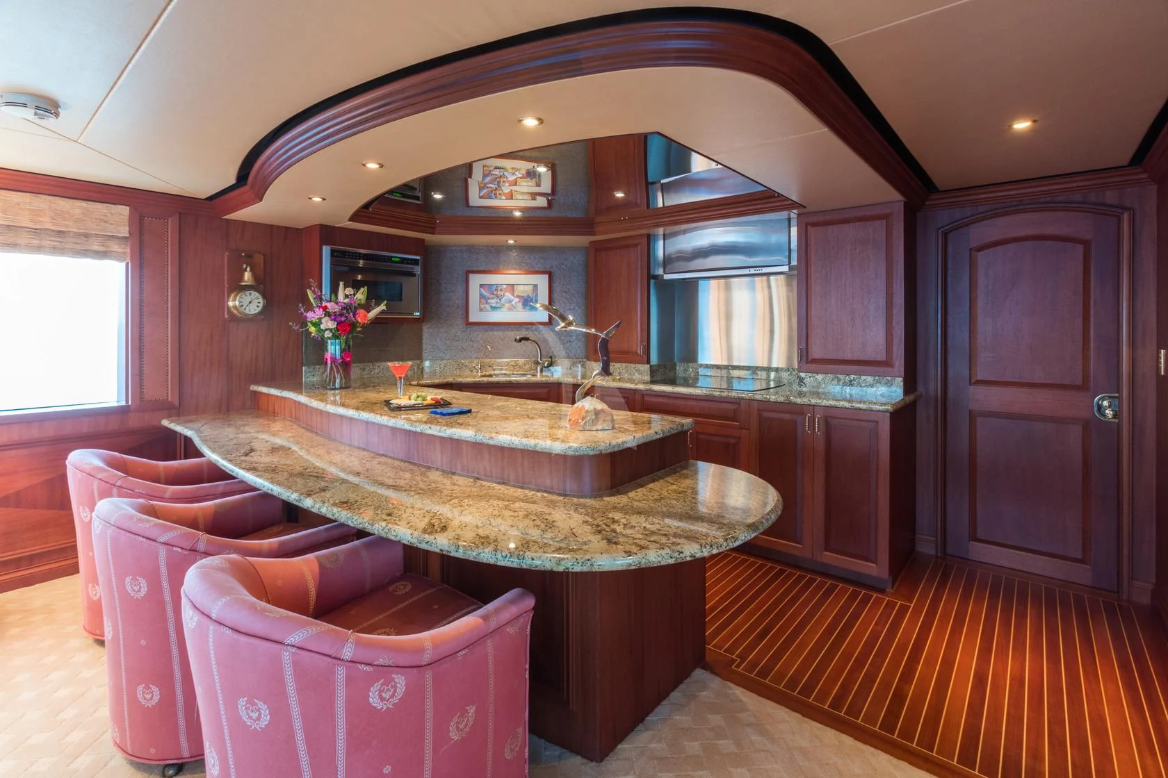 a large kitchen with a marble counter aboard SHOGUN Yacht for Sale