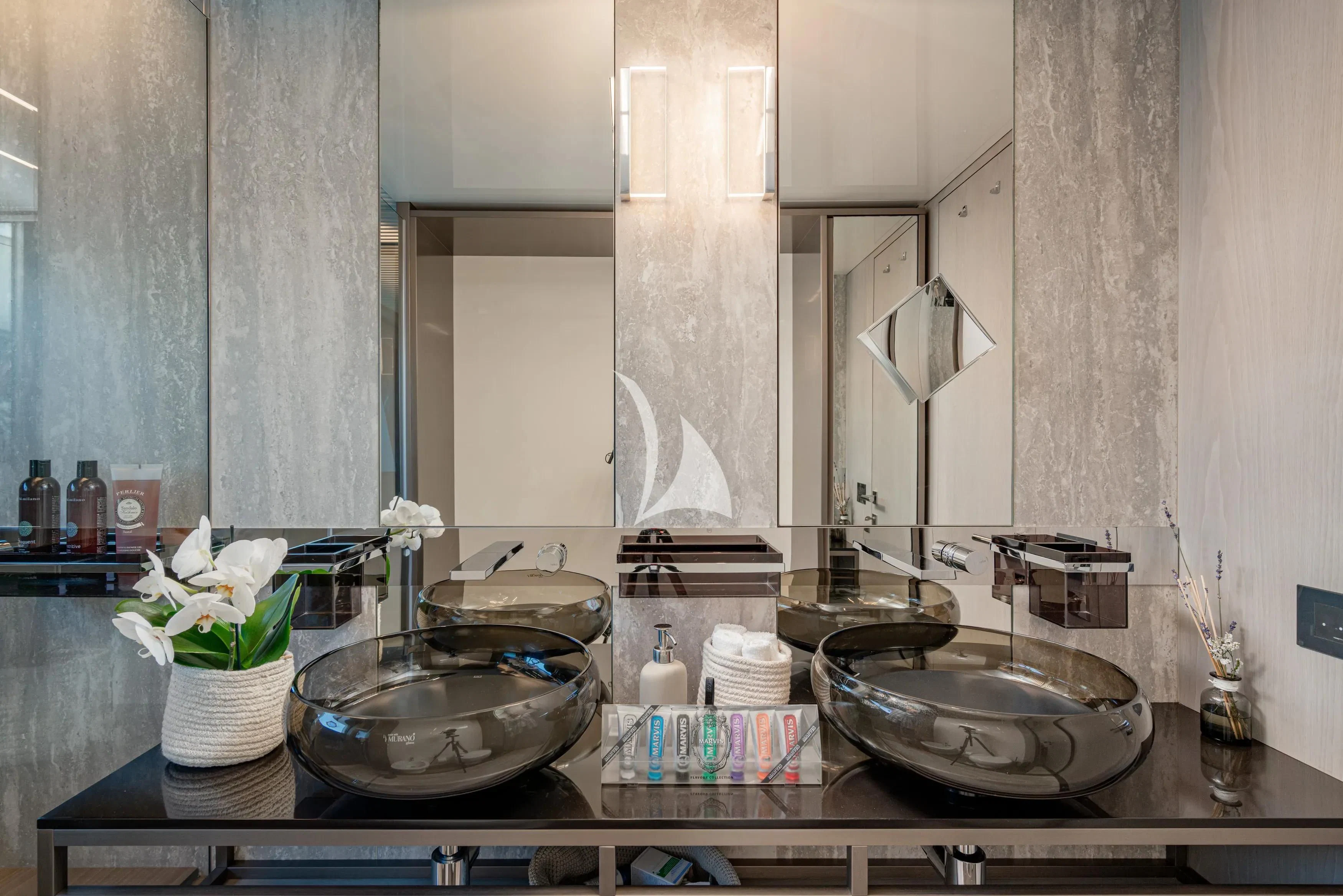 a bathroom with sinks and mirrors aboard E3 Yacht for Sale