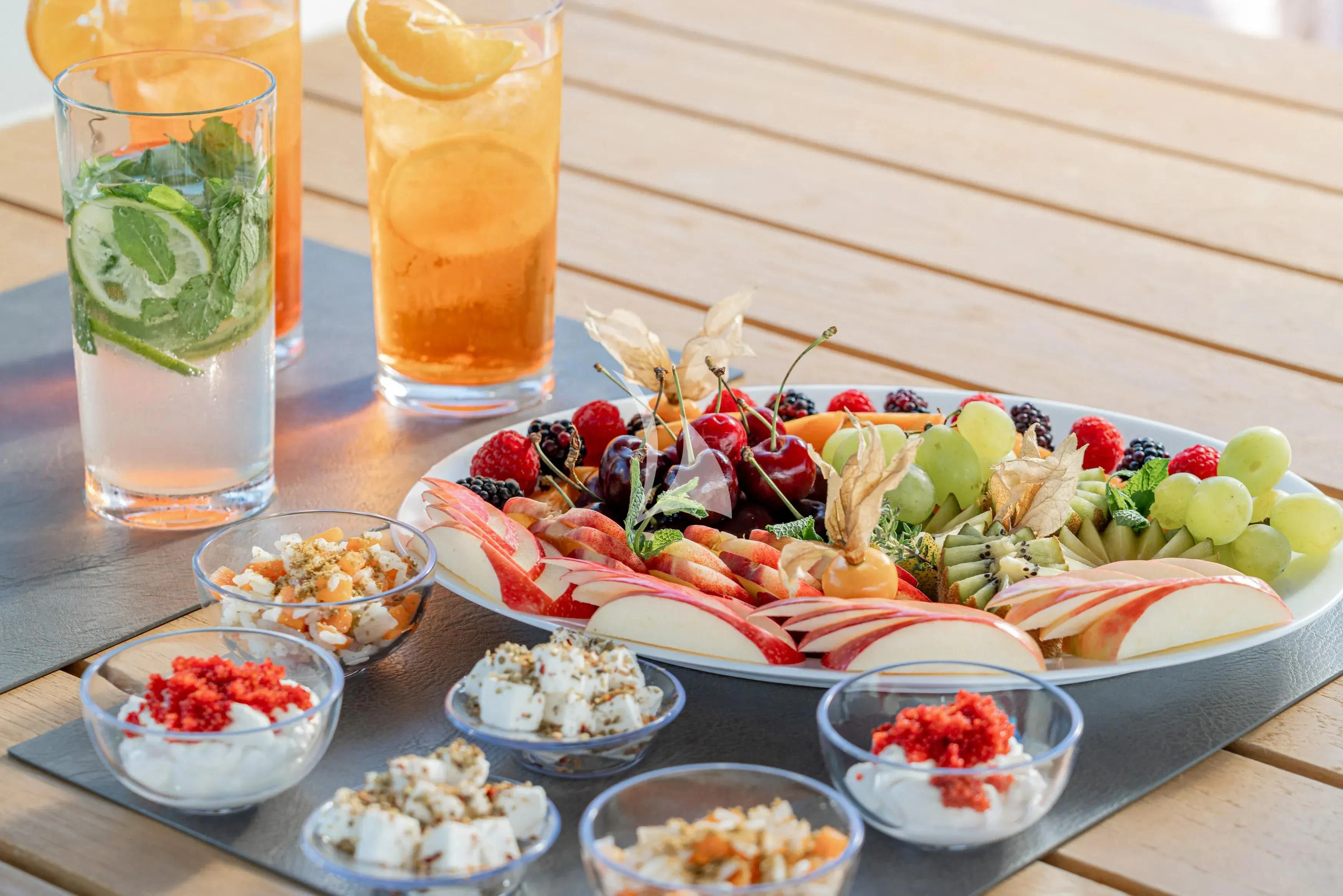 a table full of food aboard E3 Yacht for Sale