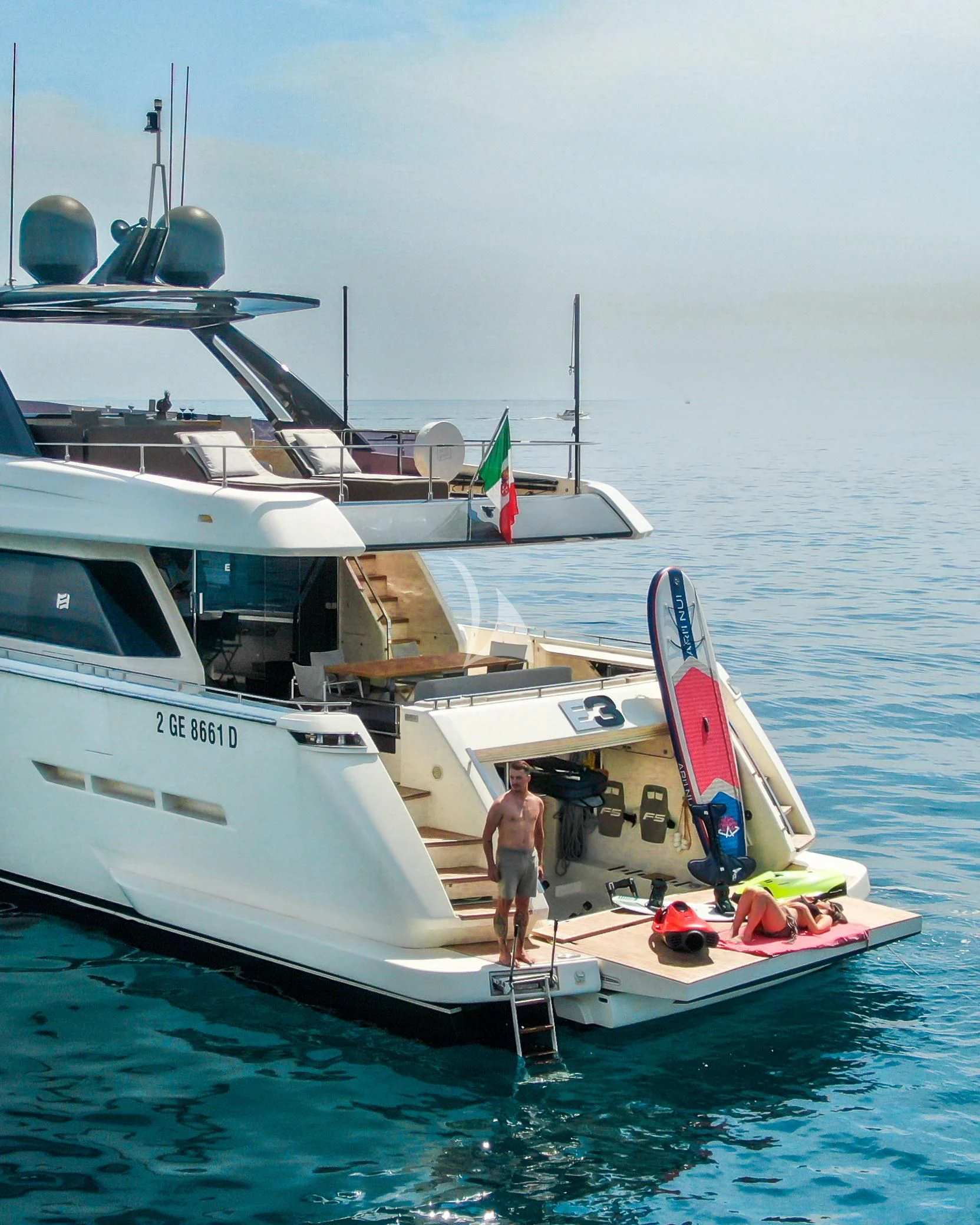 a person standing on a boat aboard E3 Yacht for Sale