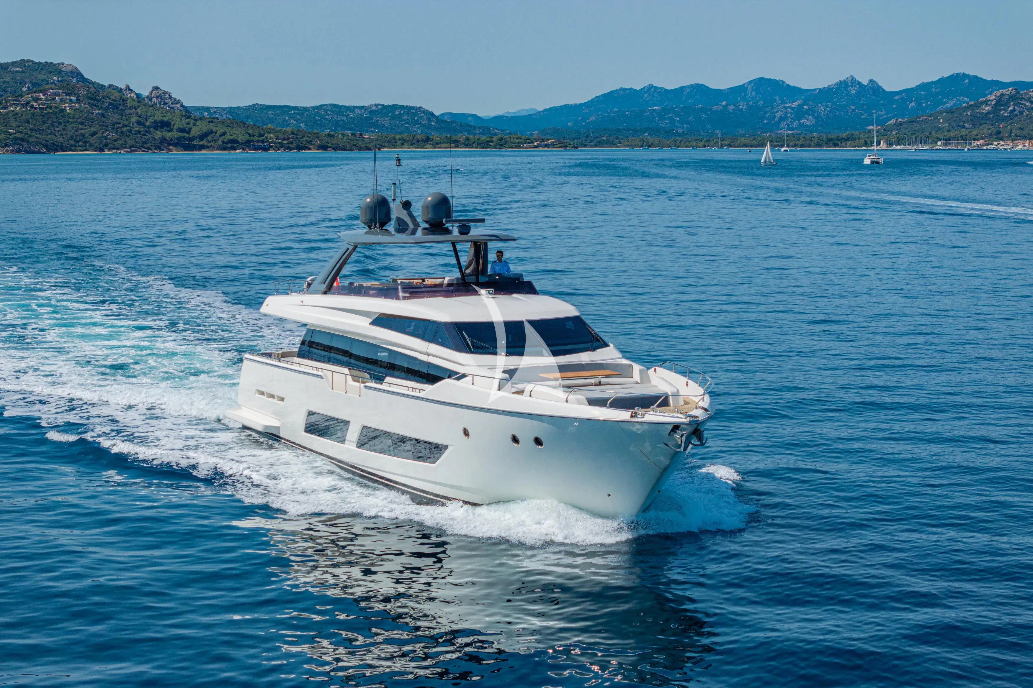 a white yacht on the water aboard E3 Yacht for Sale