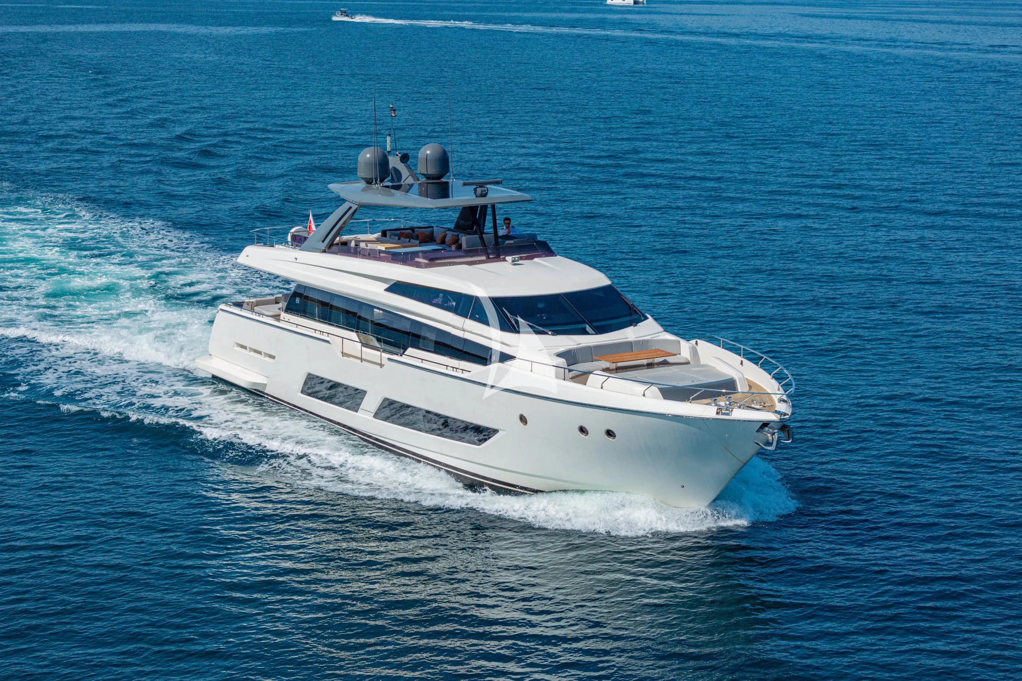 a white yacht on the water aboard E3 Yacht for Sale