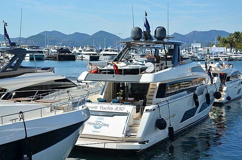several boats are parked in a harbor aboard E3 Yacht for Sale