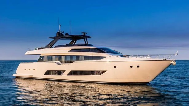 a white yacht in the water aboard E3 Yacht for Sale