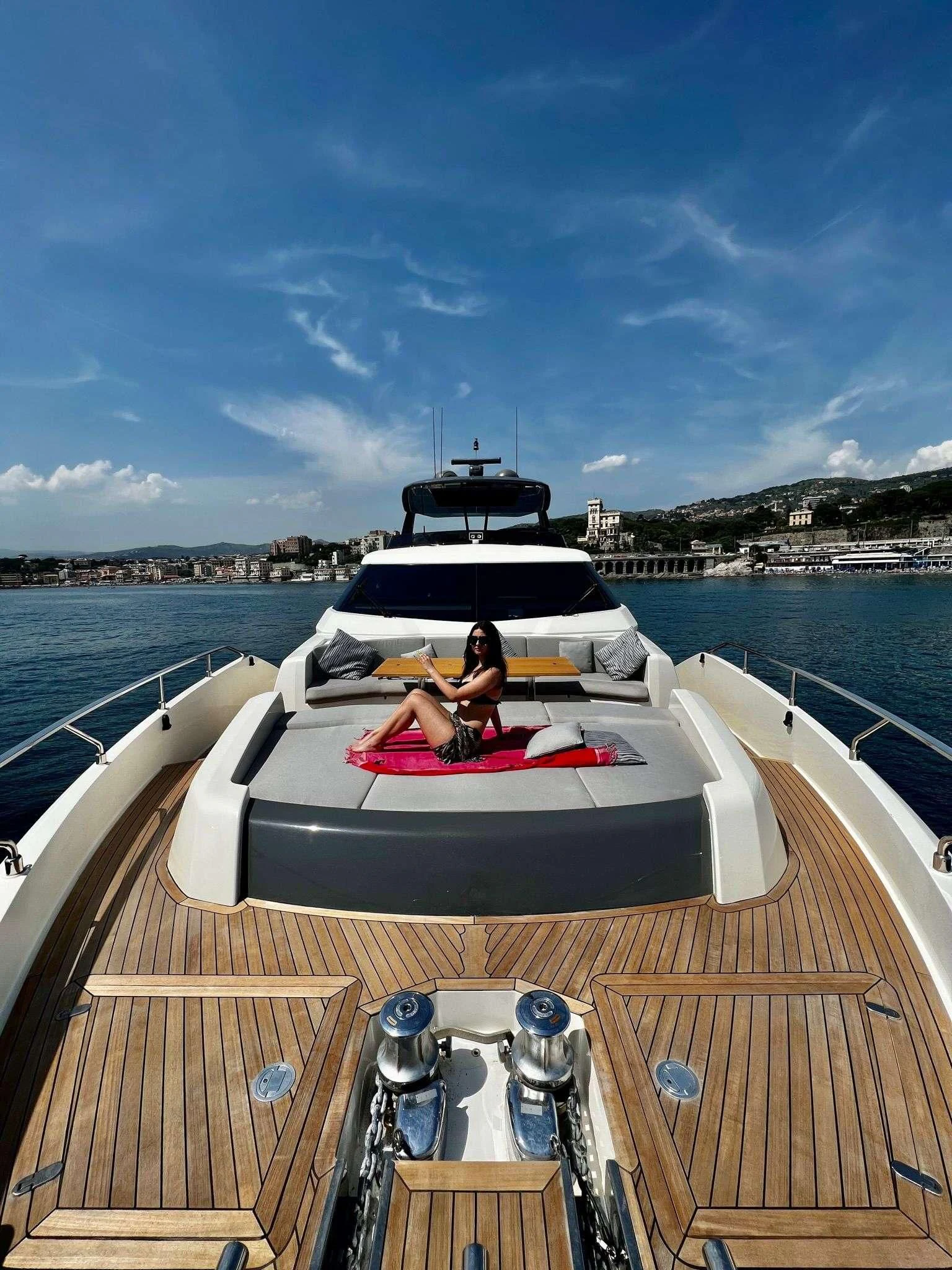 a couple people on a boat aboard E3 Yacht for Sale